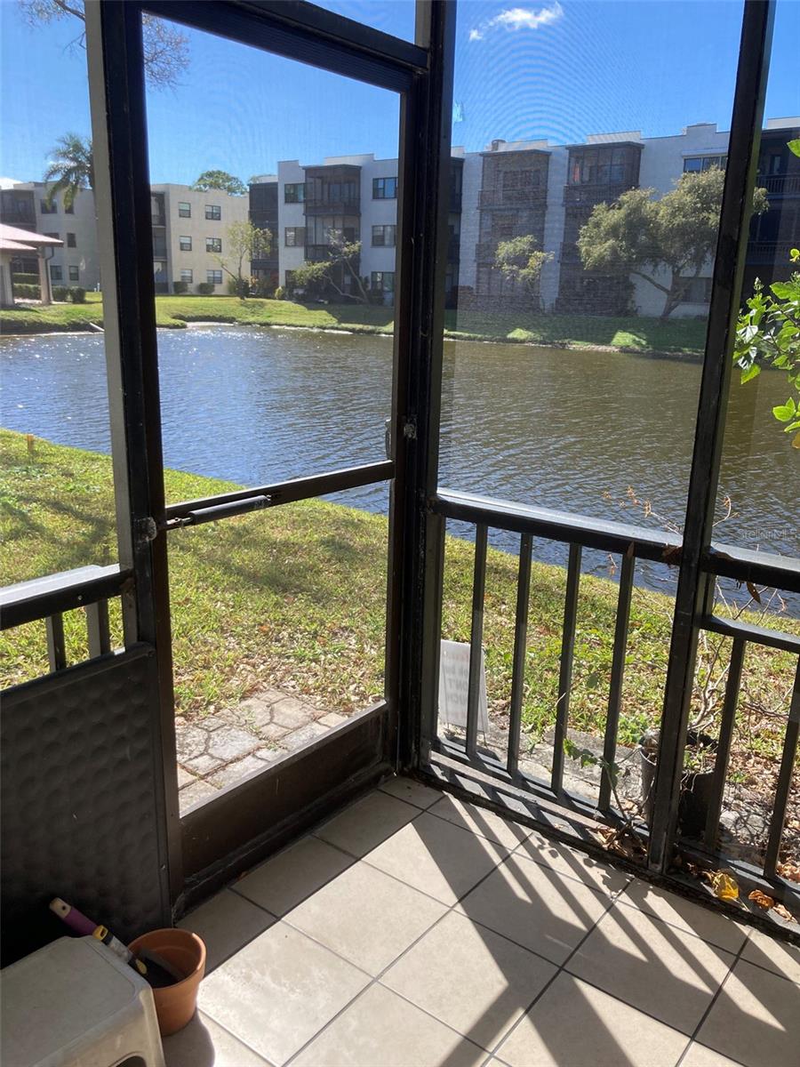 Screened porch with water view