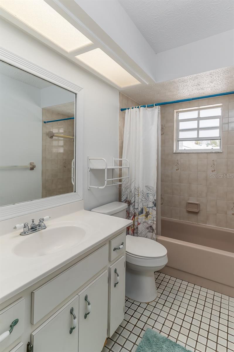 2nd bathroom, tub and shower