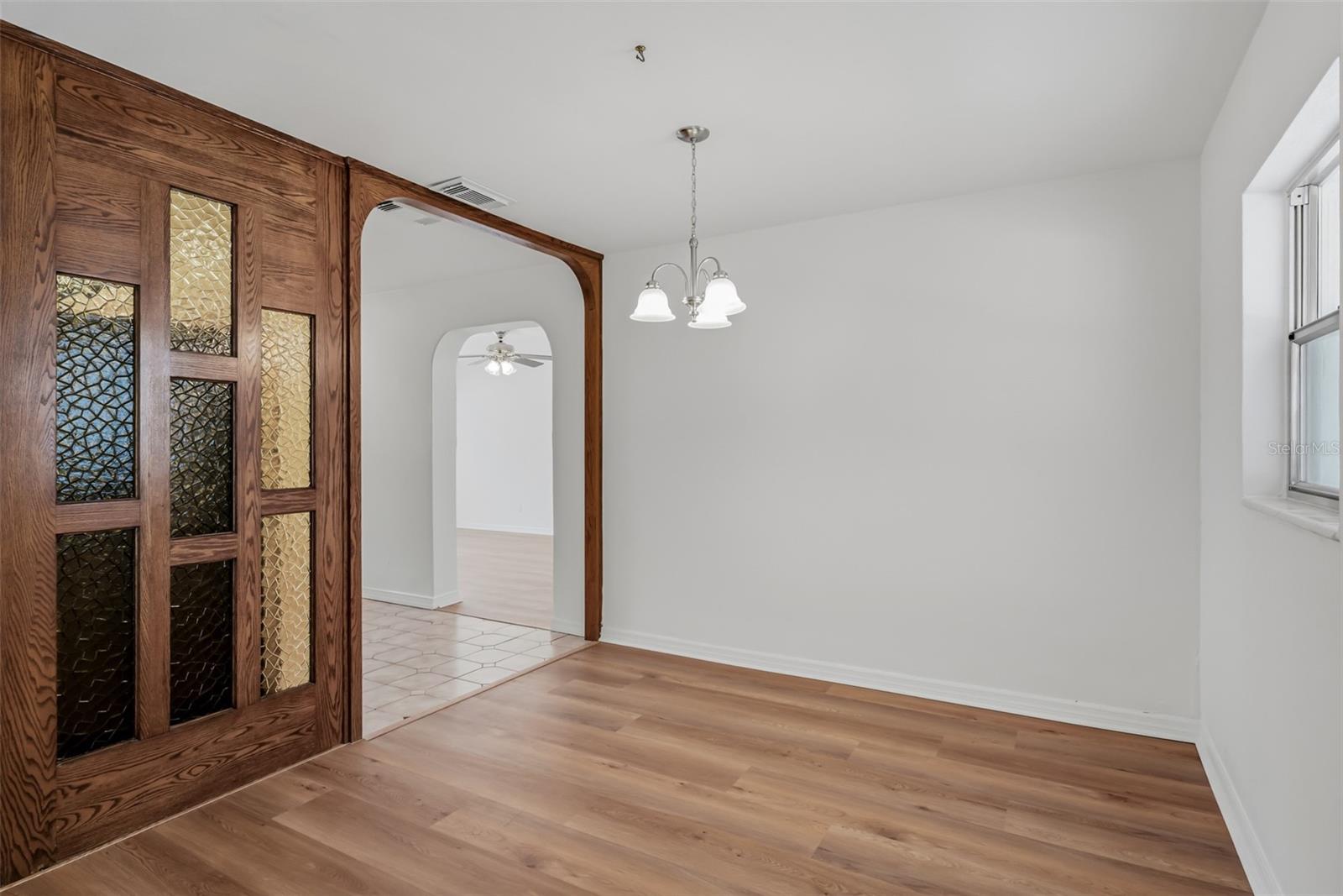 Kitchen entry with view of bonus room entry