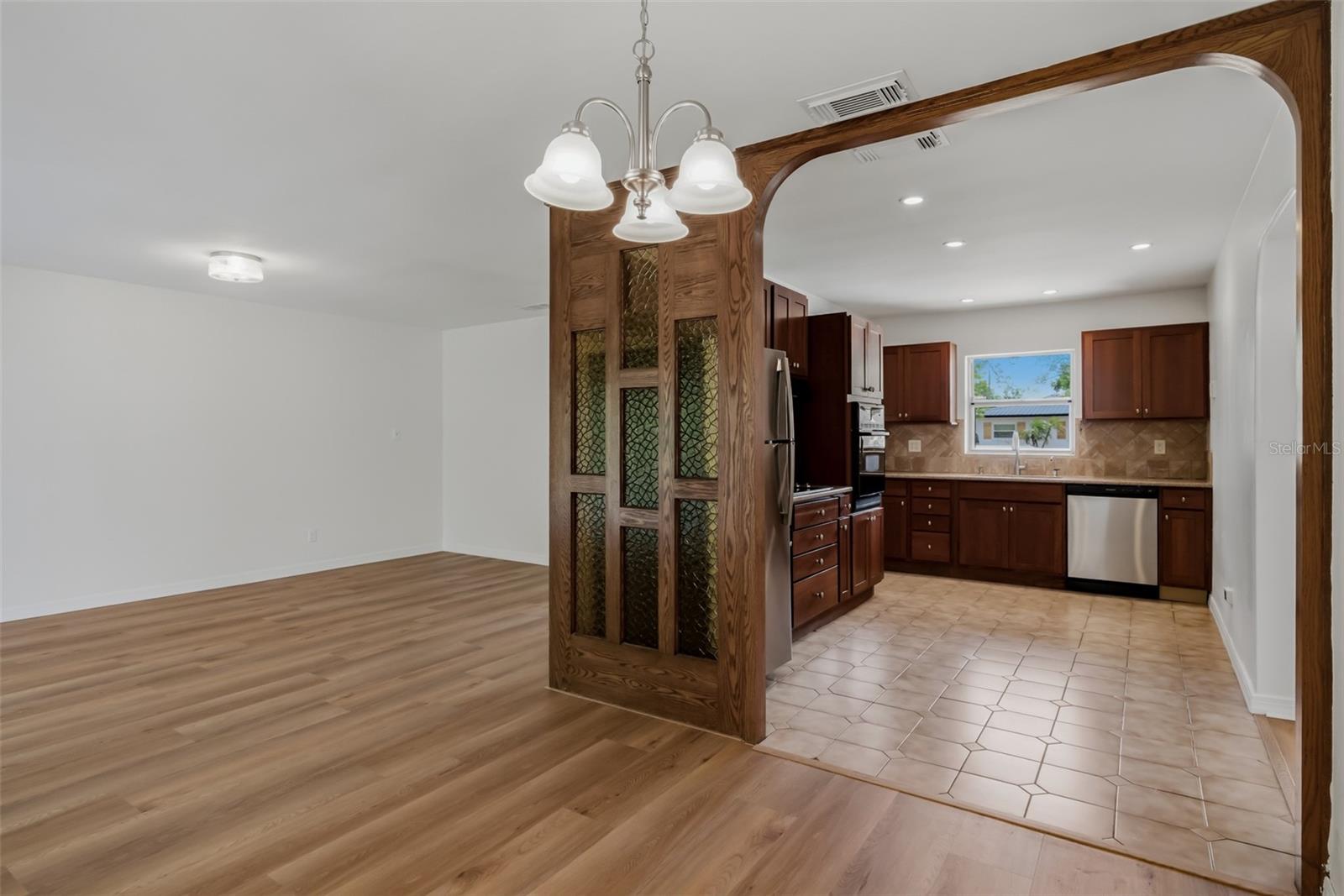 Kitchen and view of living room