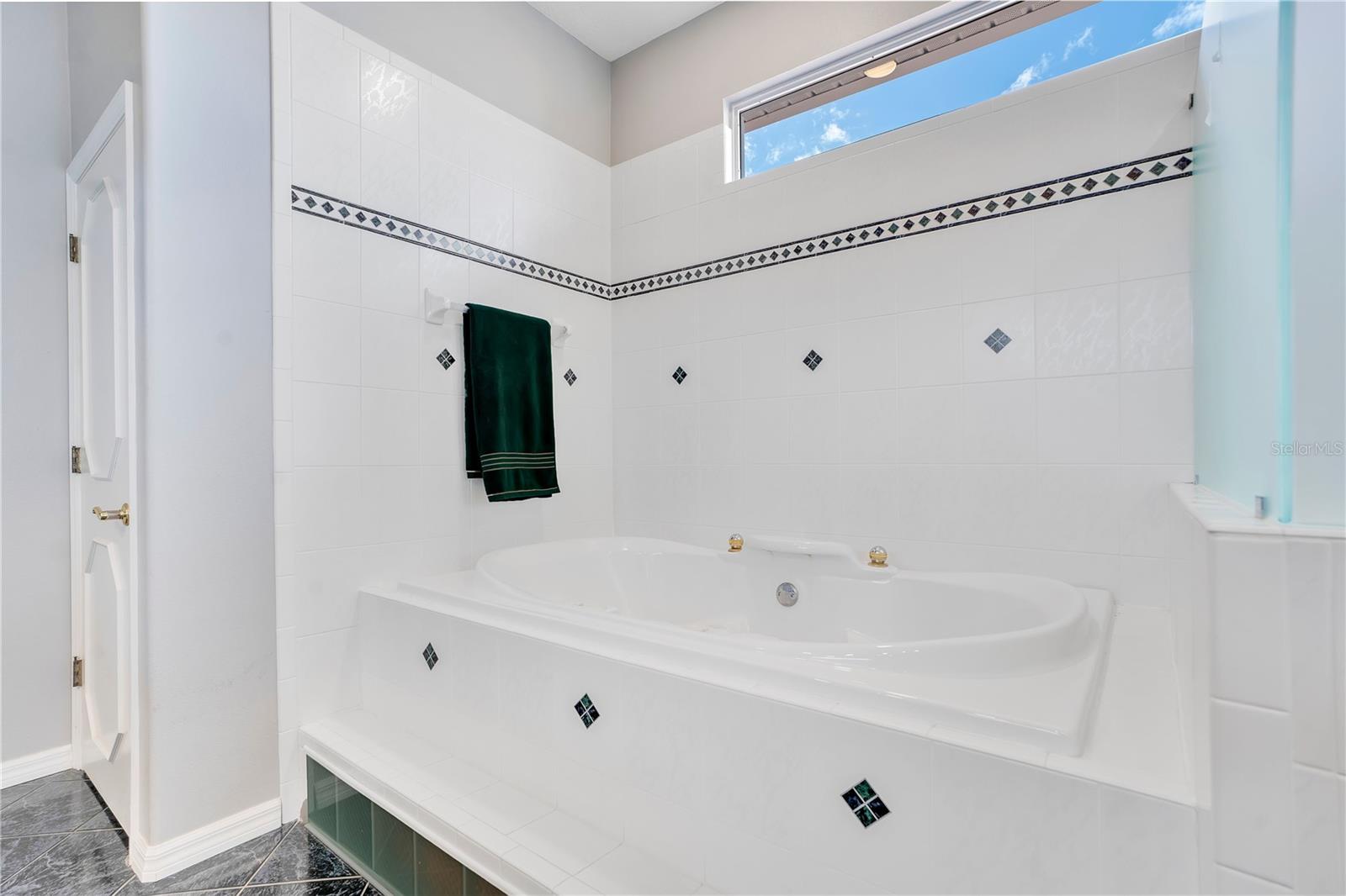 primary bathroom with jetted tub