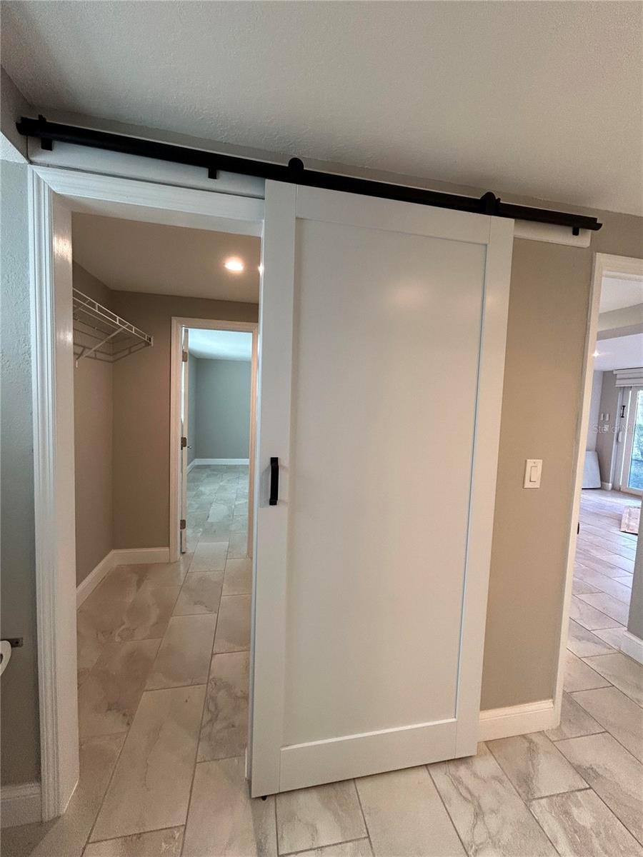 Barn door access to master bedroom