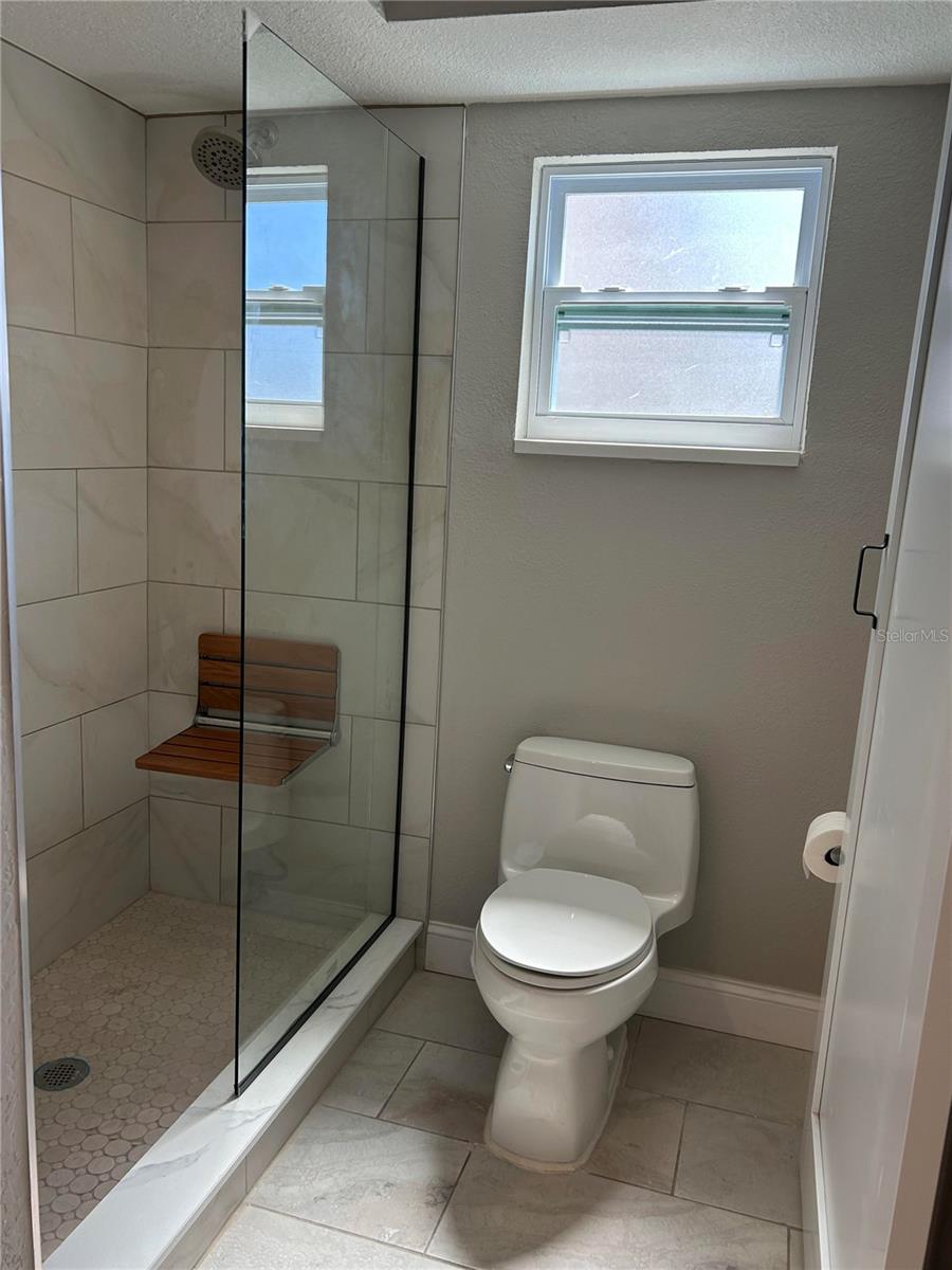 Bathroom includes window for natural light and air