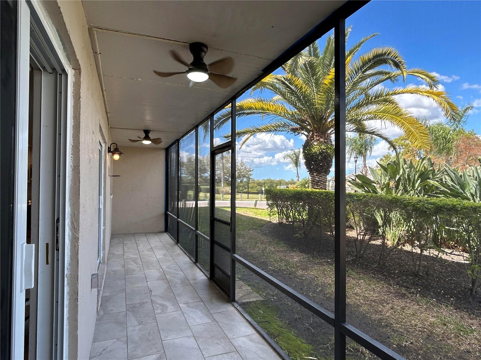 Large screened lanai features two hurricane rated new sliding doors