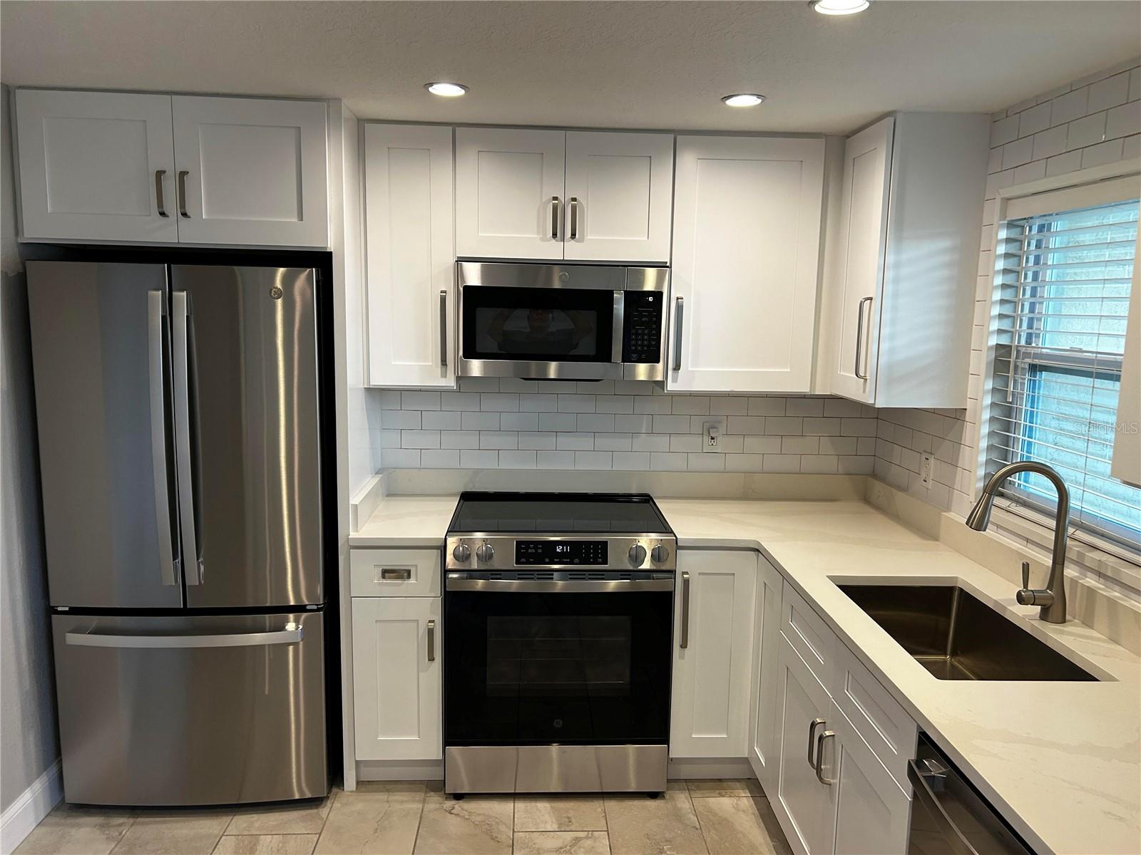 kitchen, new cabinets, quartz counter, stainless steel appliances