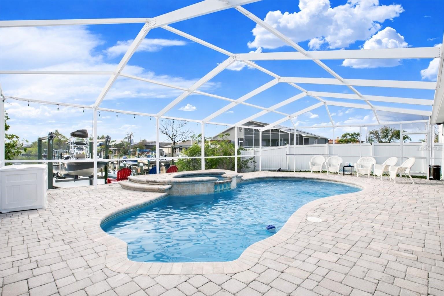 Your dream pool is waiting for you to entertain all of your friends and family as you watch the sunset in your new home at the end of the canal overlooking your boat