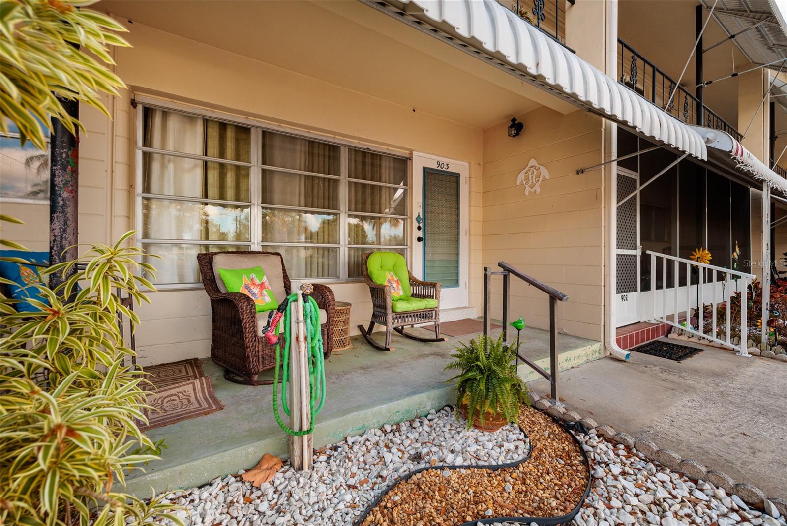 Inviting Front Porch to enjoy morning coffee or evening sunsets.