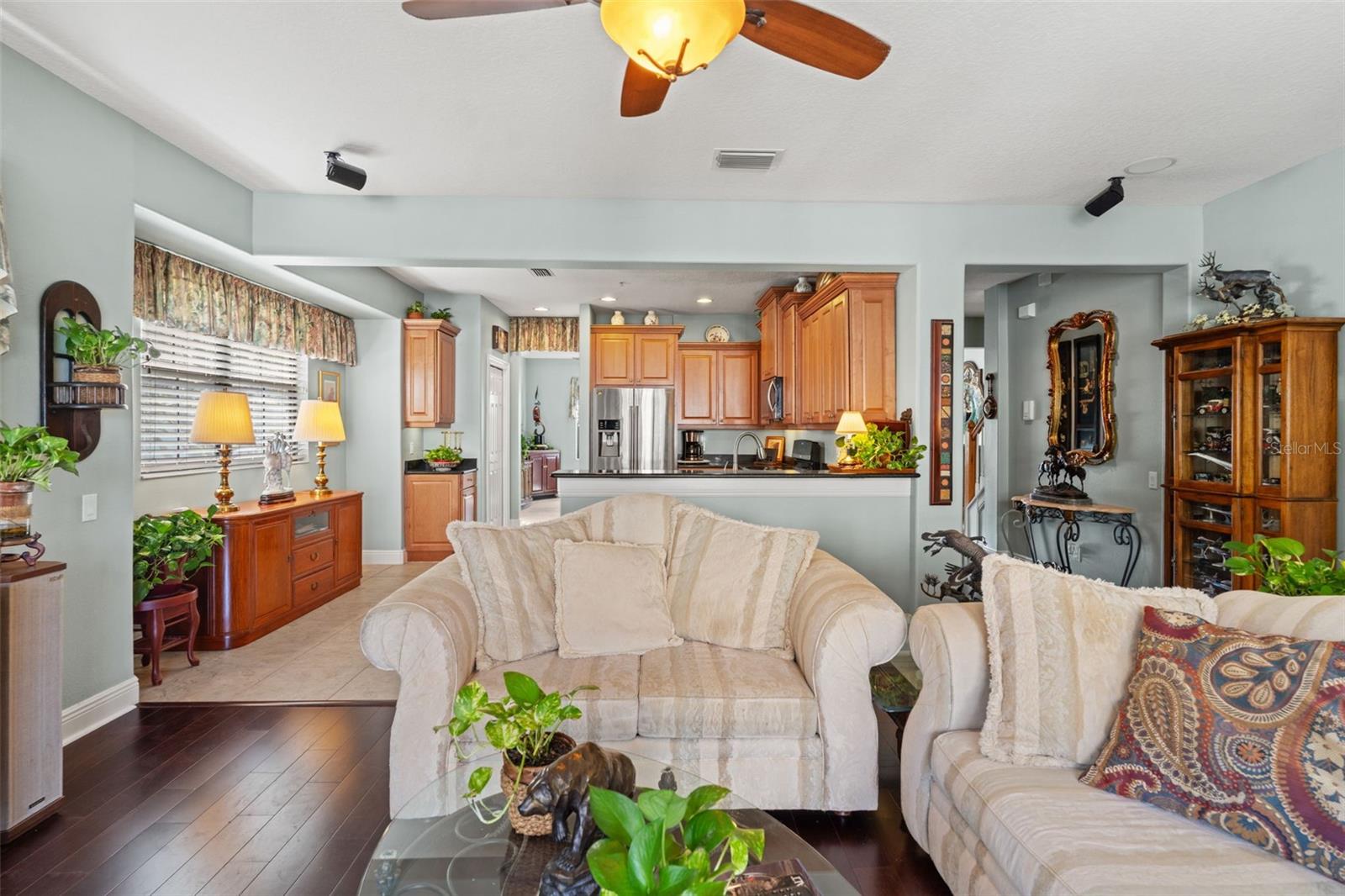 Well-appointed dining space with crown molding, multiple windows, and room for a large dining table.
