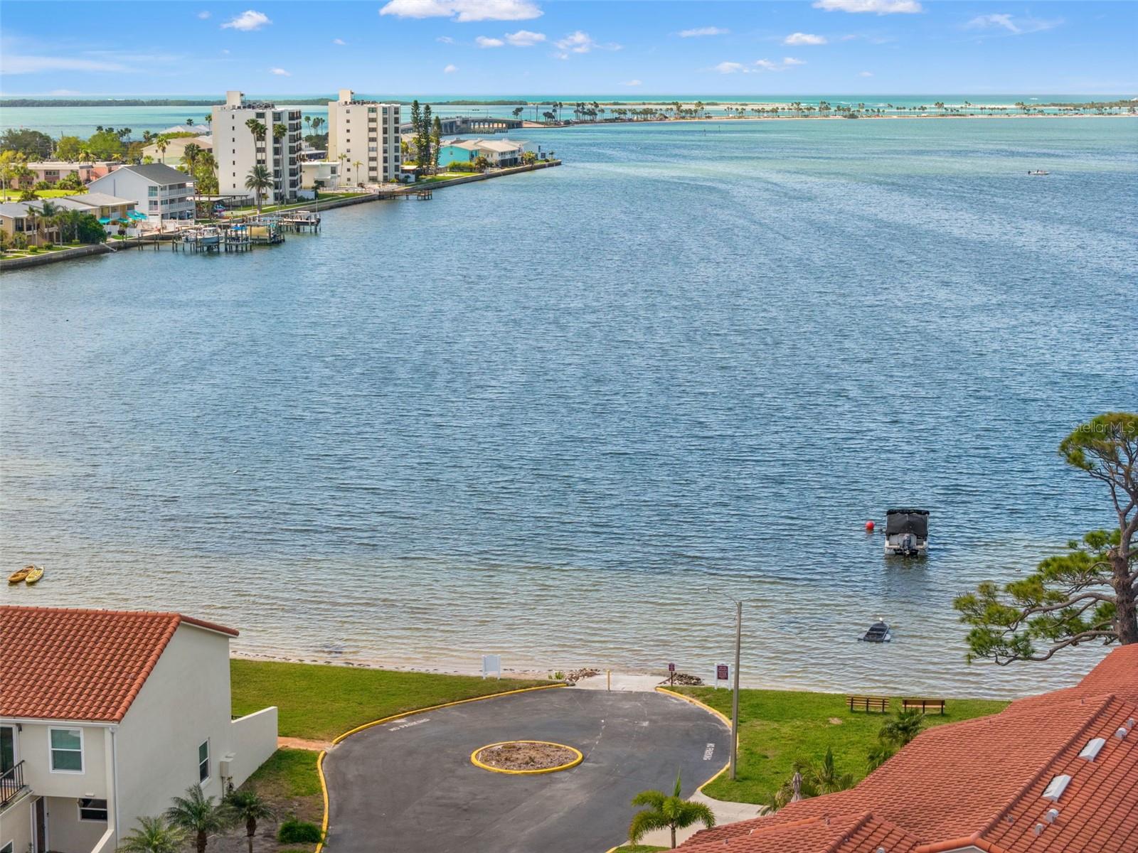 Scenic views overlooking the bay with nearby shoreline access and open water beyond.