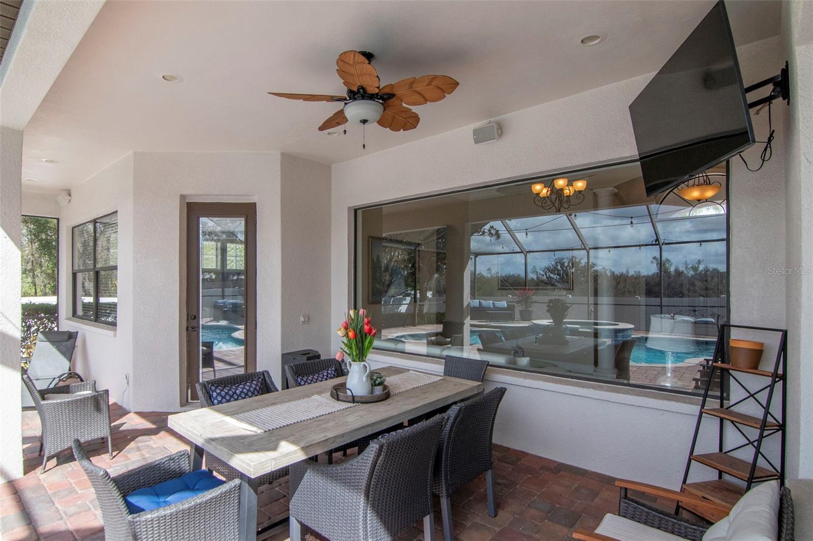 eating space on patio near pool