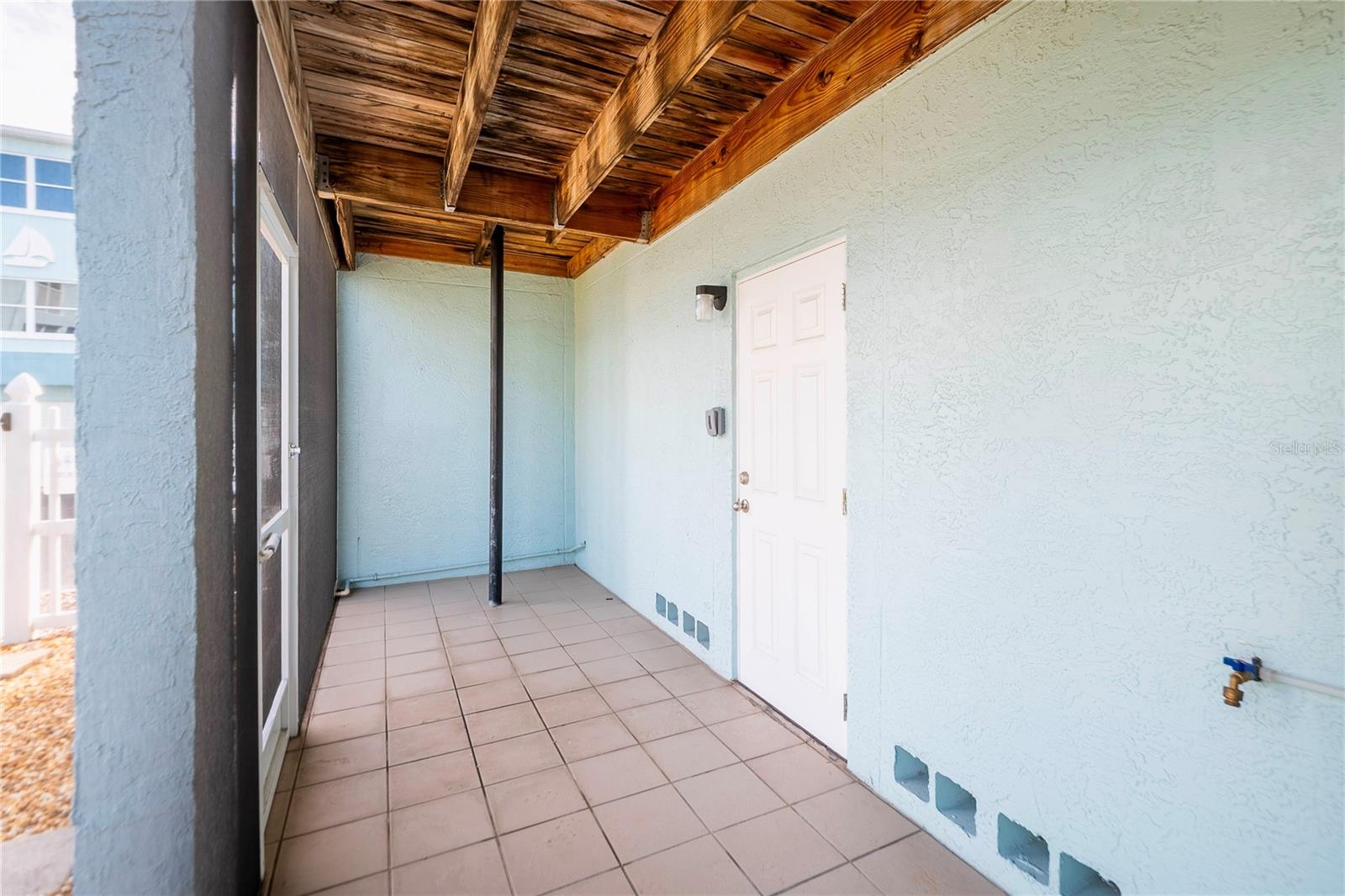 lower-level patio leading to the pool area