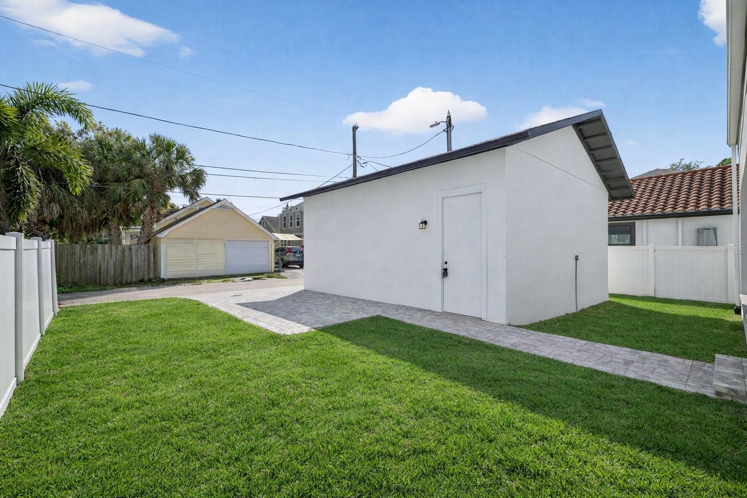 Spacious yard for your future plunge styled pool