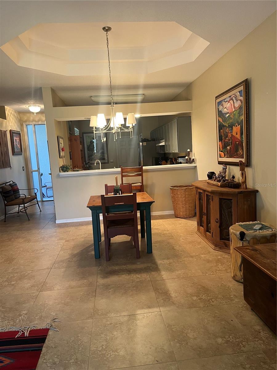 VIEW FROM LIVING ROOM TO DINING ROOM/KITCHEN