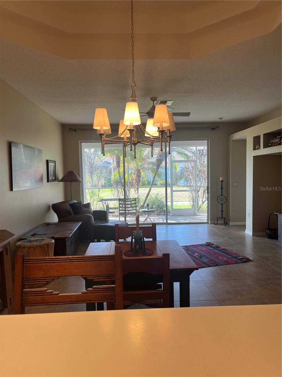 VIEW FROM KITCHEN TO LIVING ROOM/PATIO