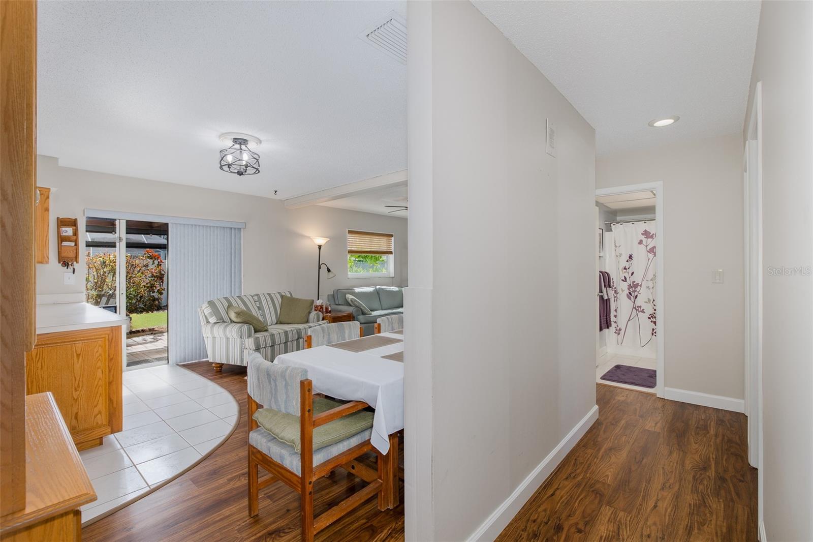 Hallway to spare bedrooms and kitchen/family room