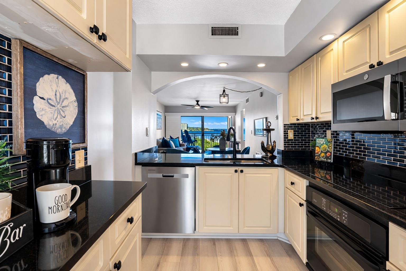 Upgraded Kitchen with Black Granite Countertops