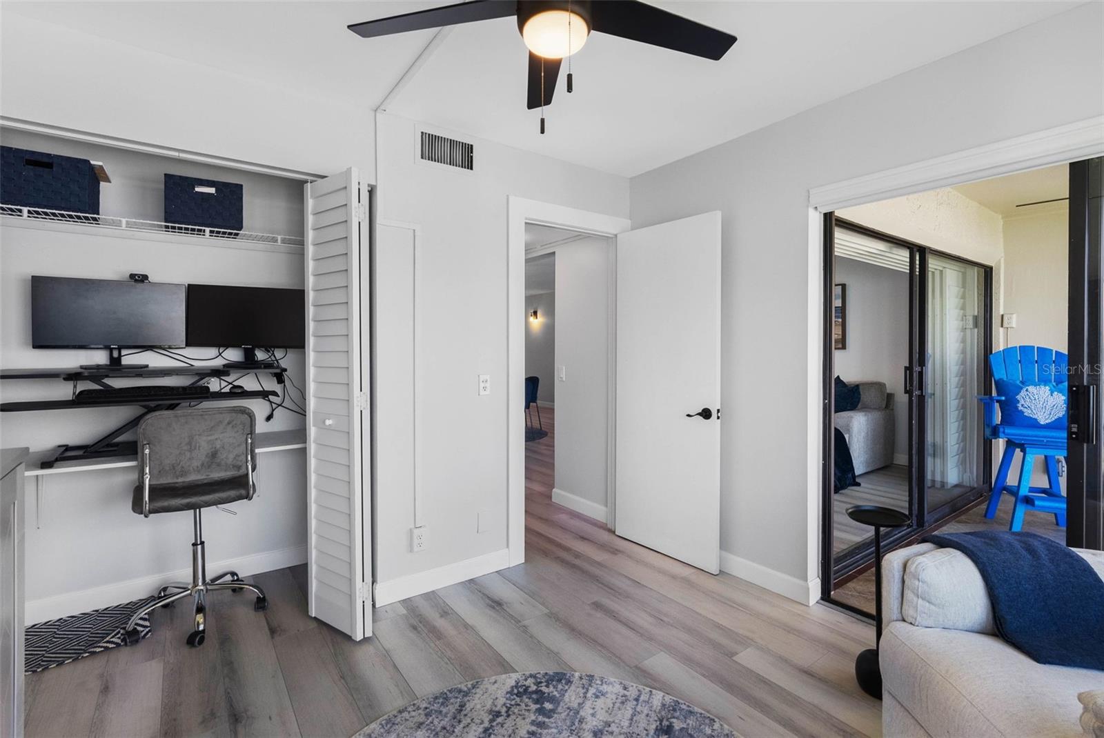 Gust Bedroom has a desk for home office in closet.