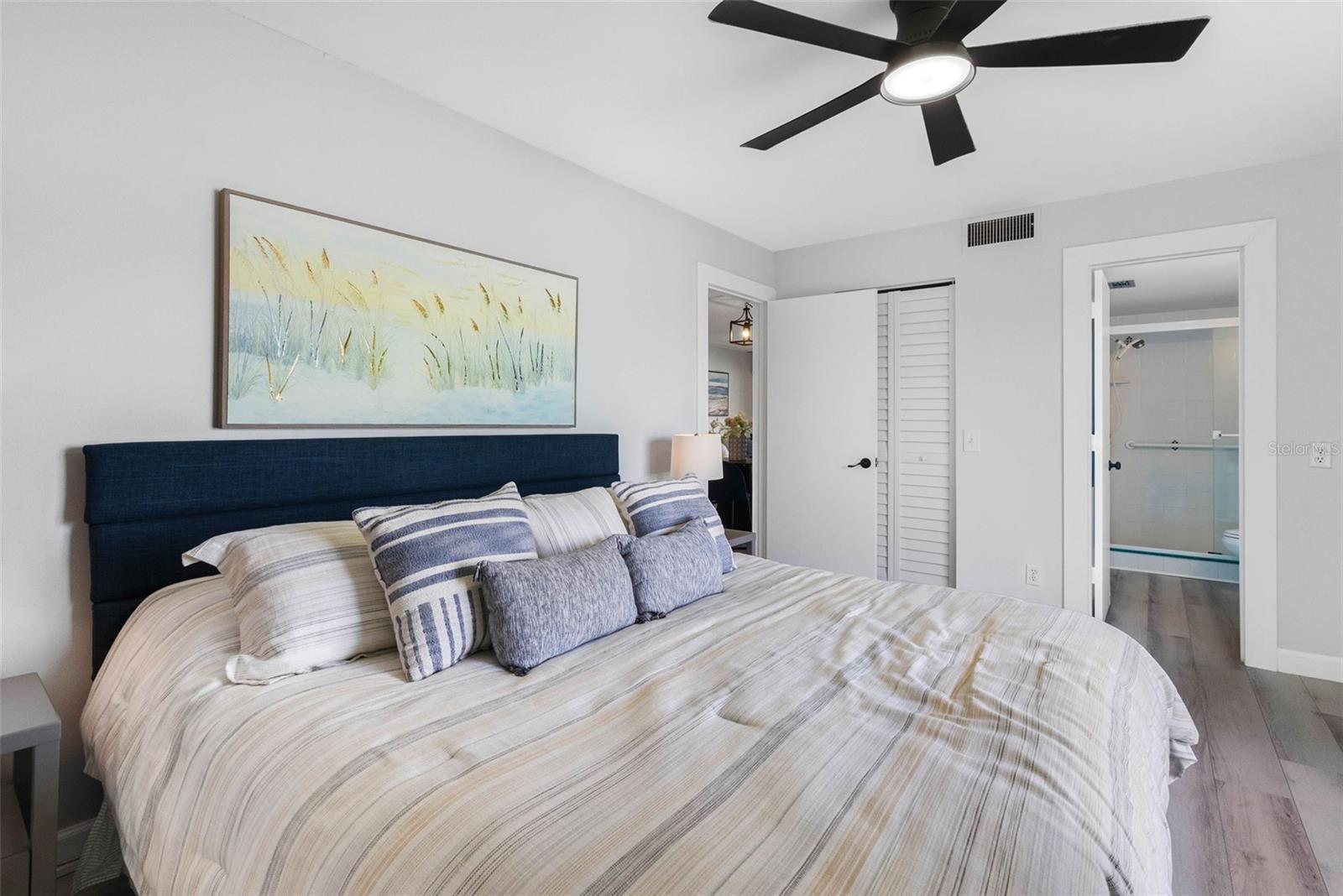 Wake Up to Bay Views from the Primary Bedroom