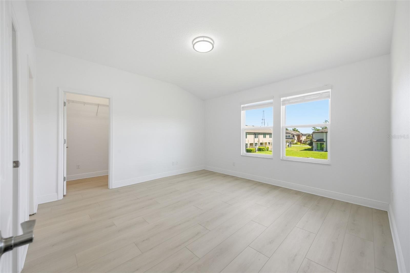 so much light and a large walk-in closet