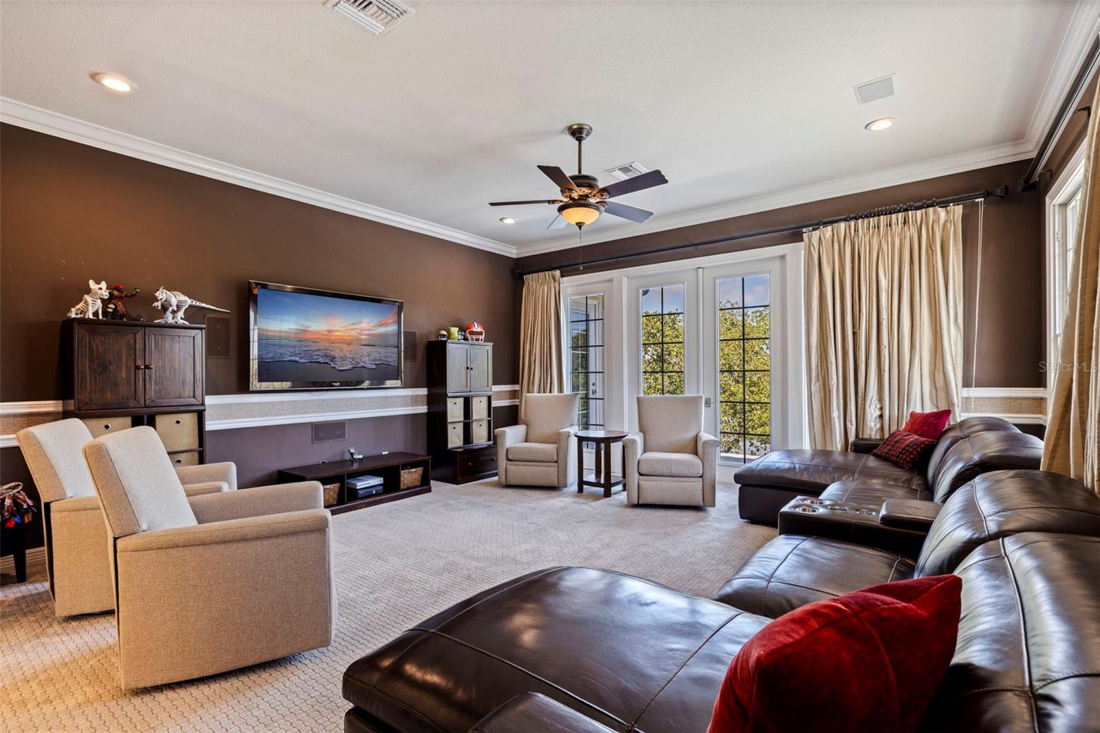 Media room opens to a roof top balcony