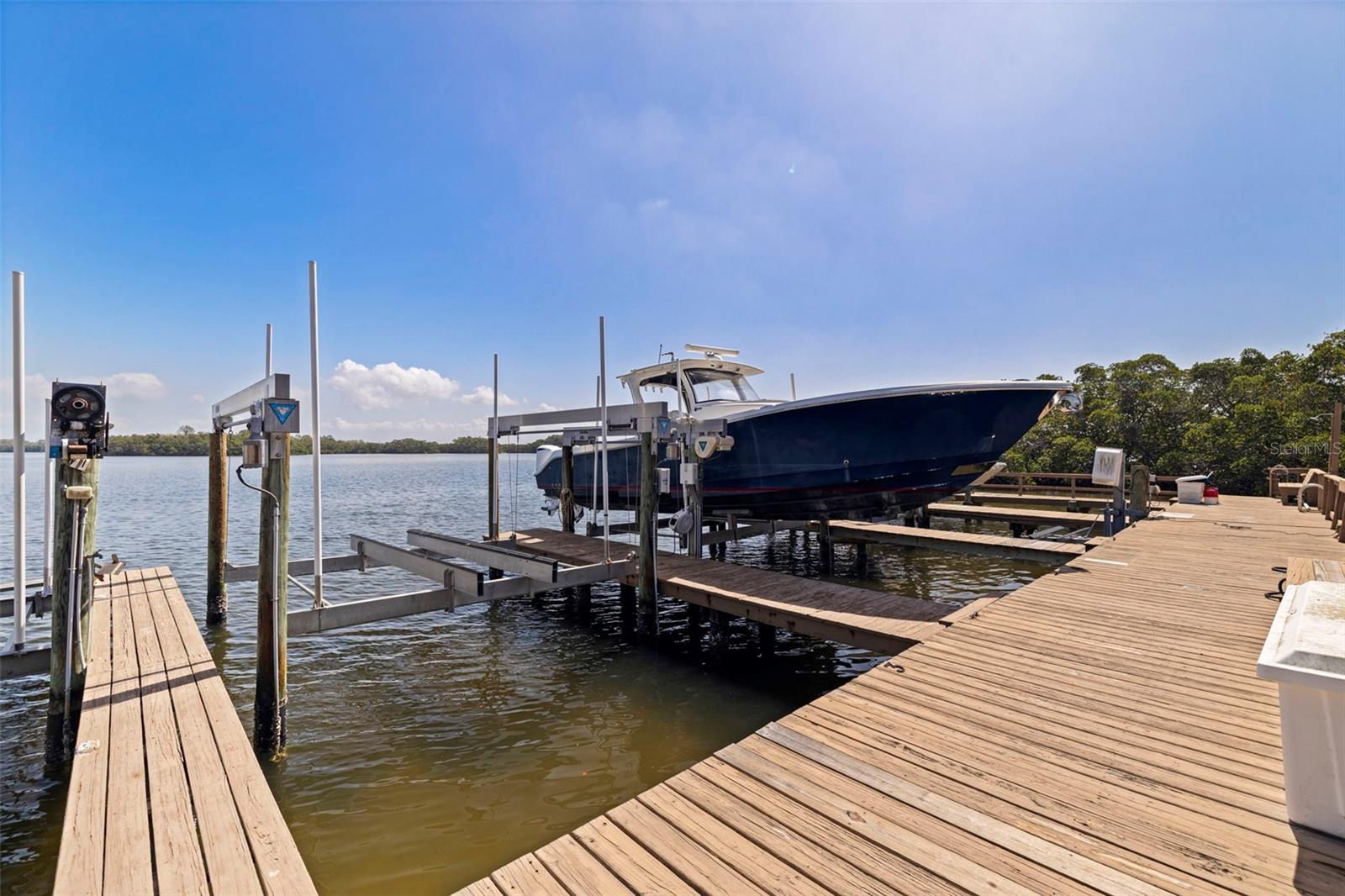 Dock with lift, water, and electric