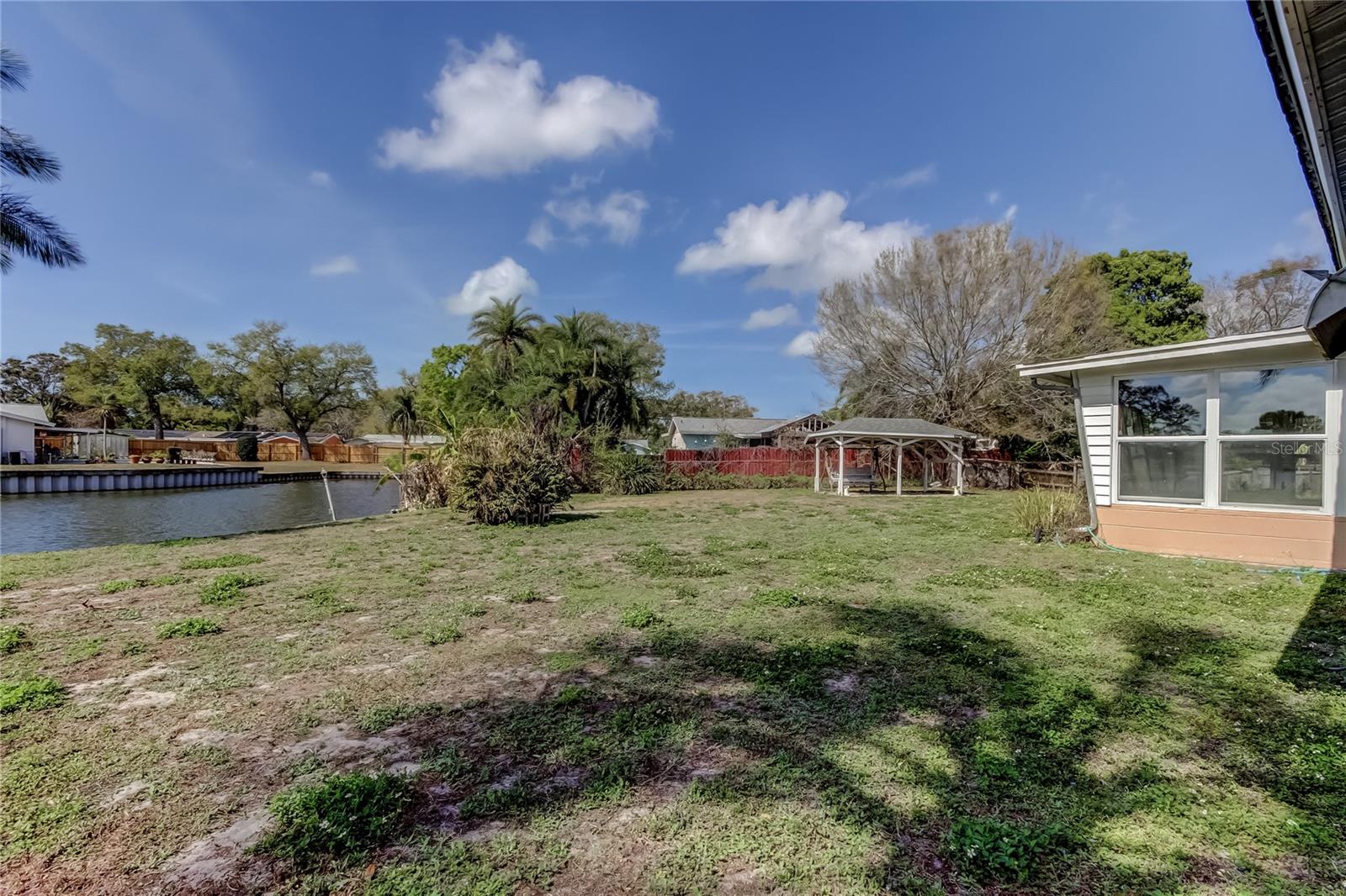Big backyard with a beautiful breeze.