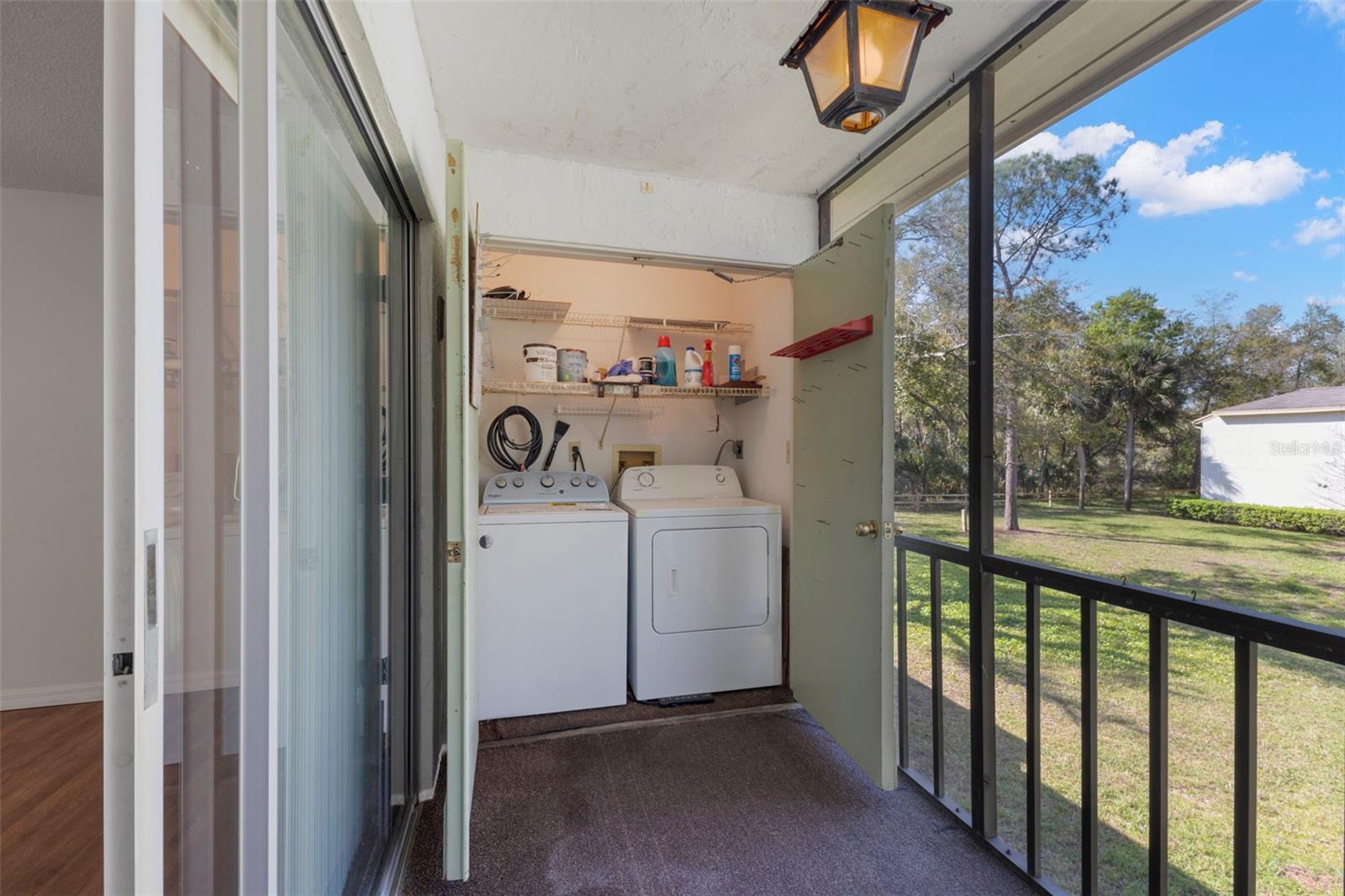 Screened lanai with laundry closet