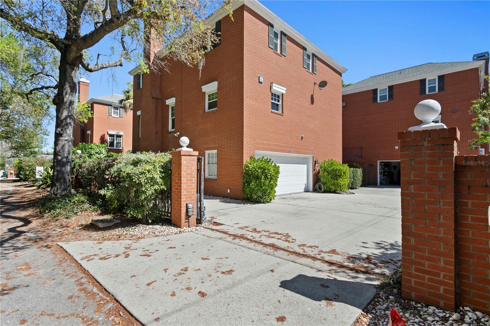 Gated entrace to rear and garage