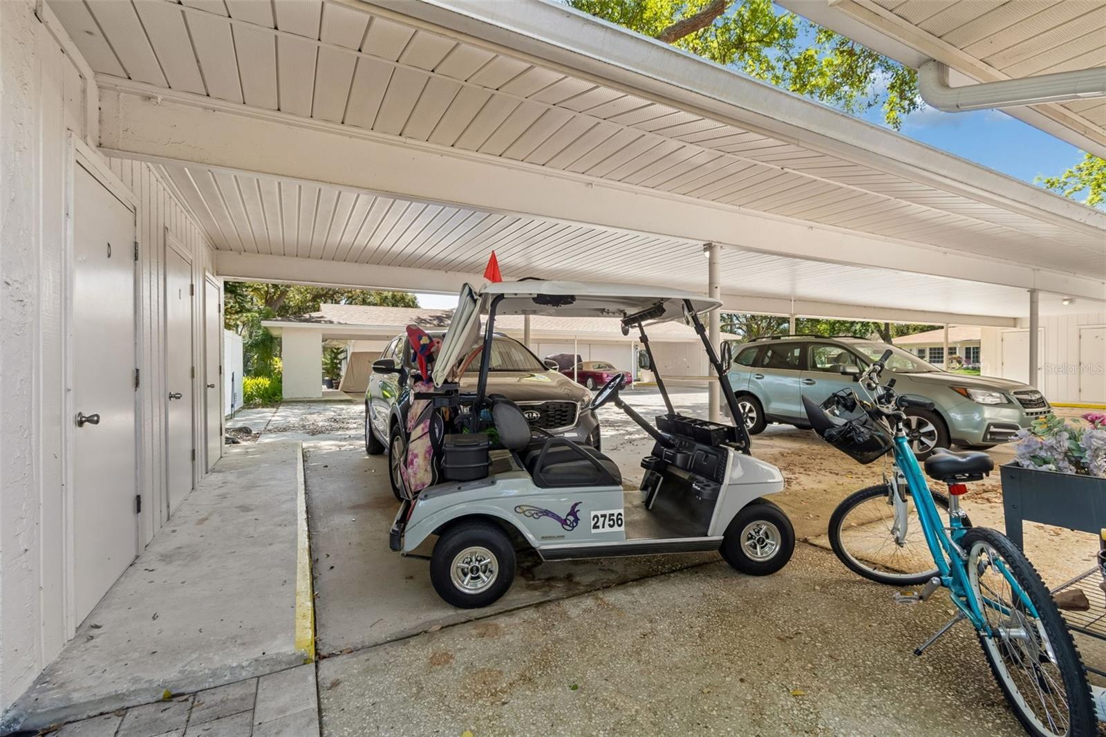Spacious Parking. Room enough for a car, golf cart & a Bike!