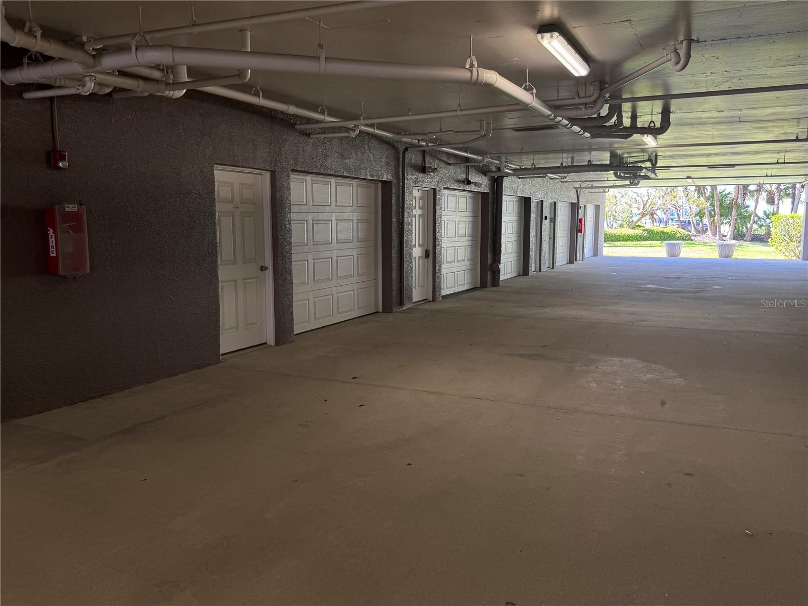 Under building covered private garage access from building