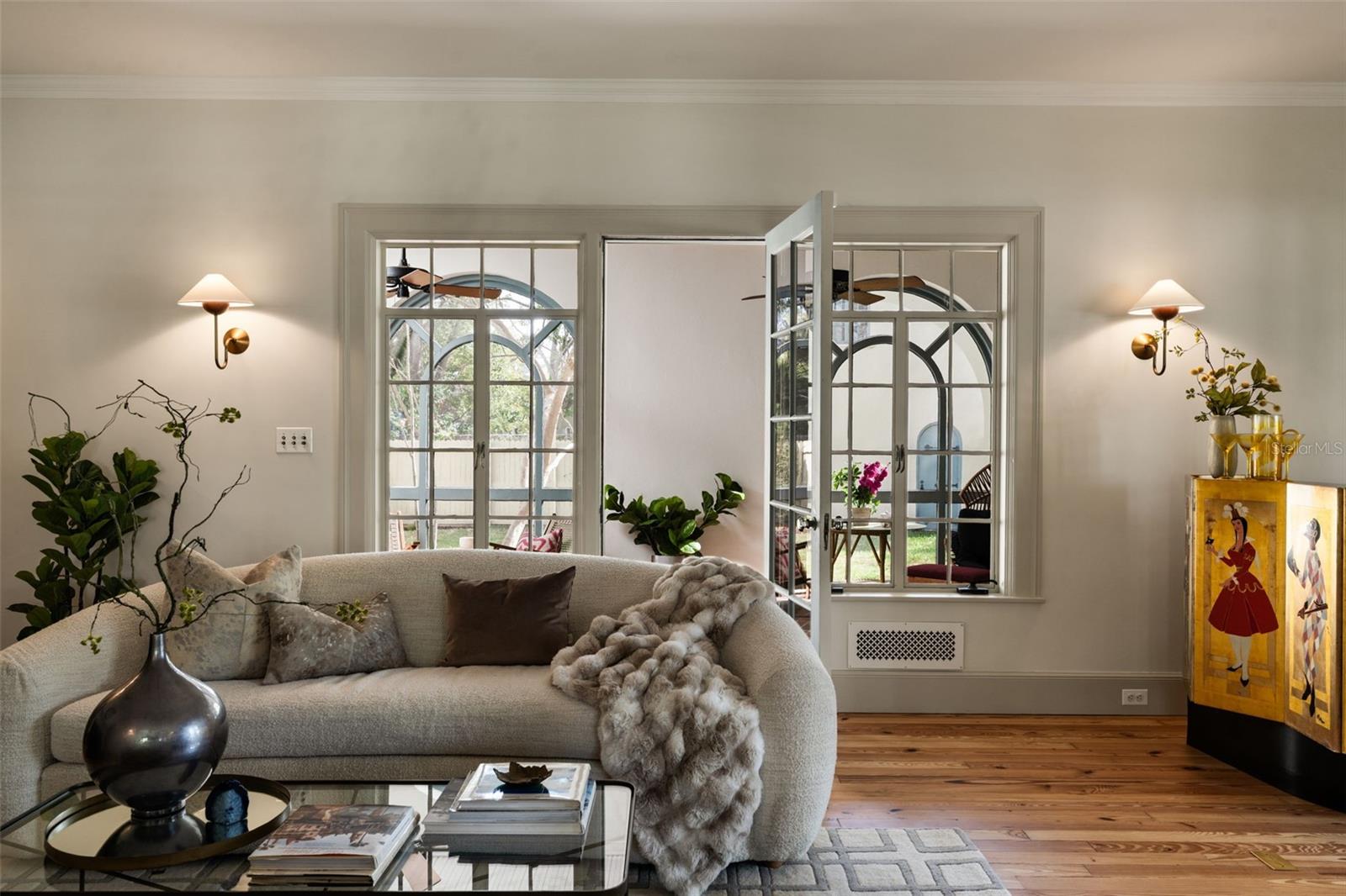 403 Jasmine Way - Living room access to the screened in porch