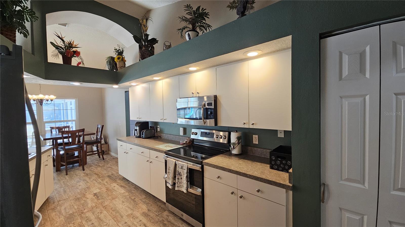 Open kitchen with pantry closet