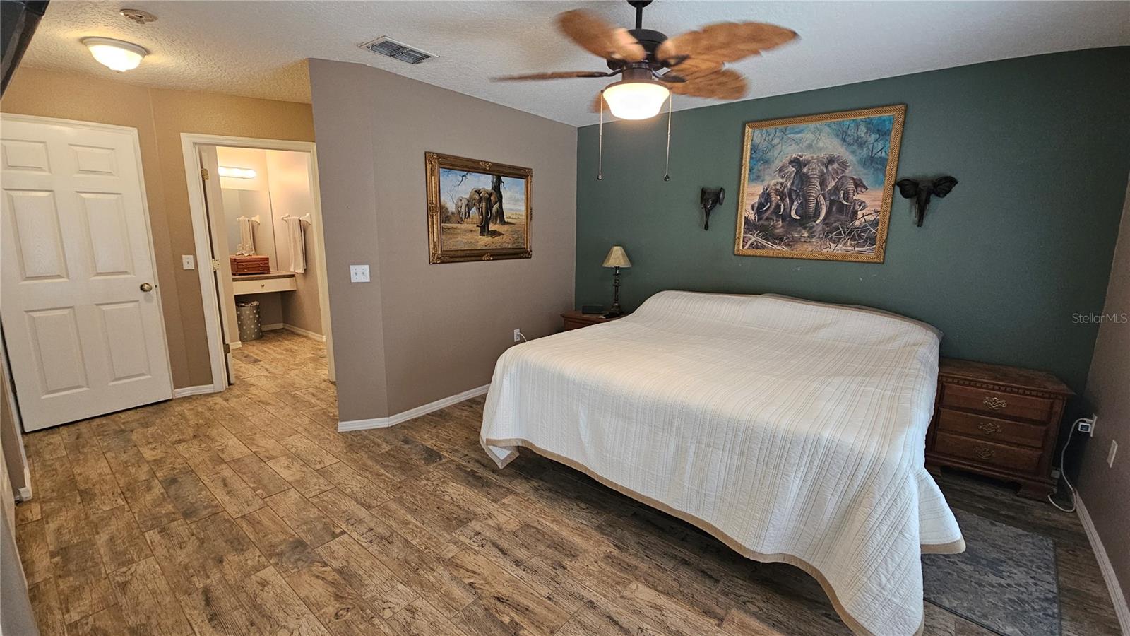 Master Bedroom with slider door to pool/Patio & 3 Closets!