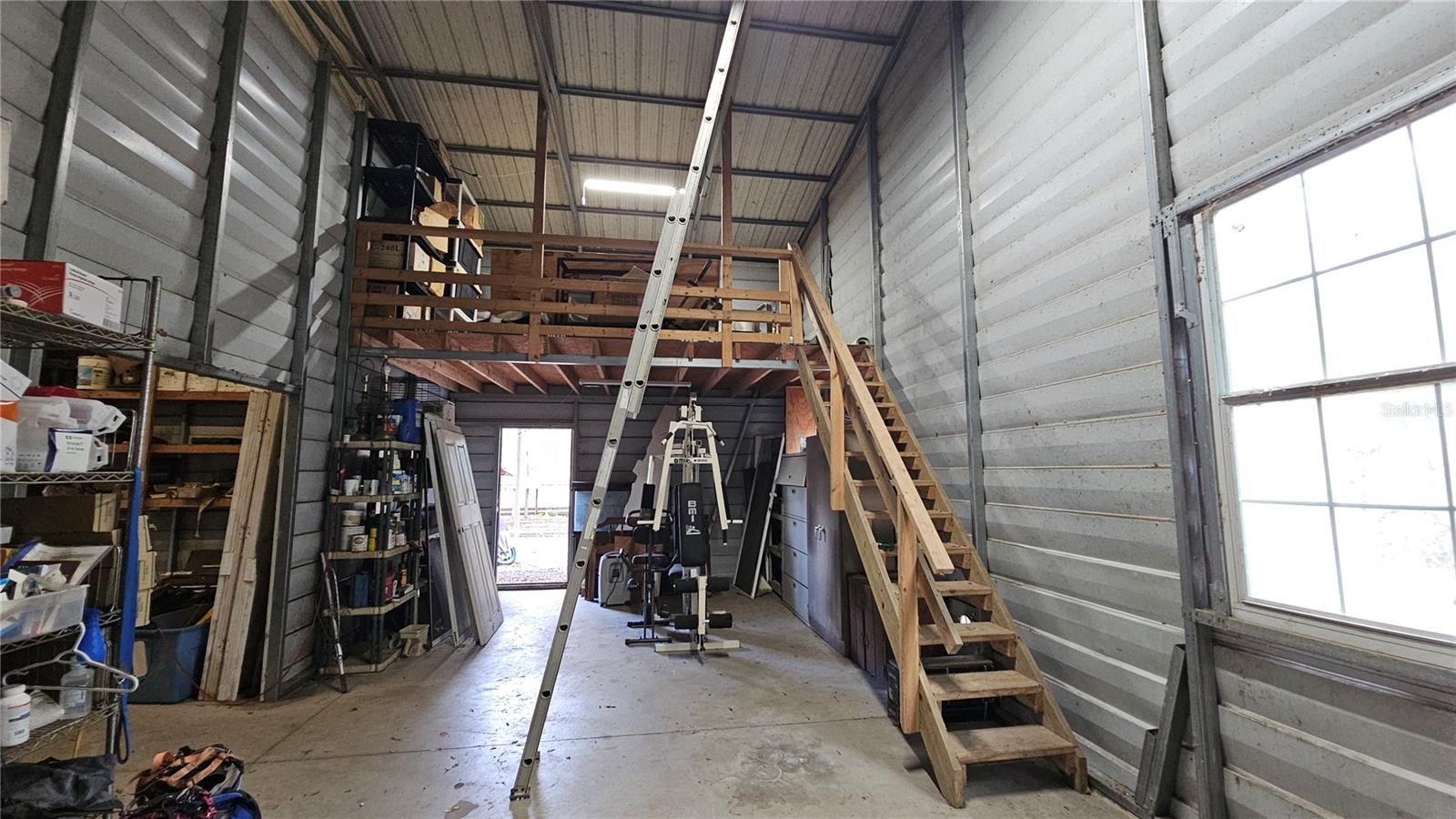 Upstairs storage loft area inside metal building/shop