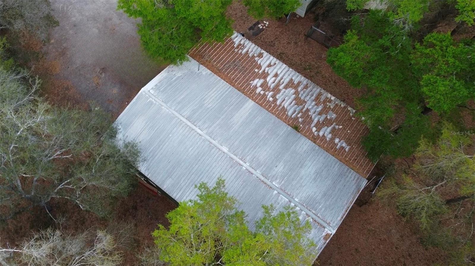 HUGE 28 x 60 metal building/shop + Overhang+ storage loft