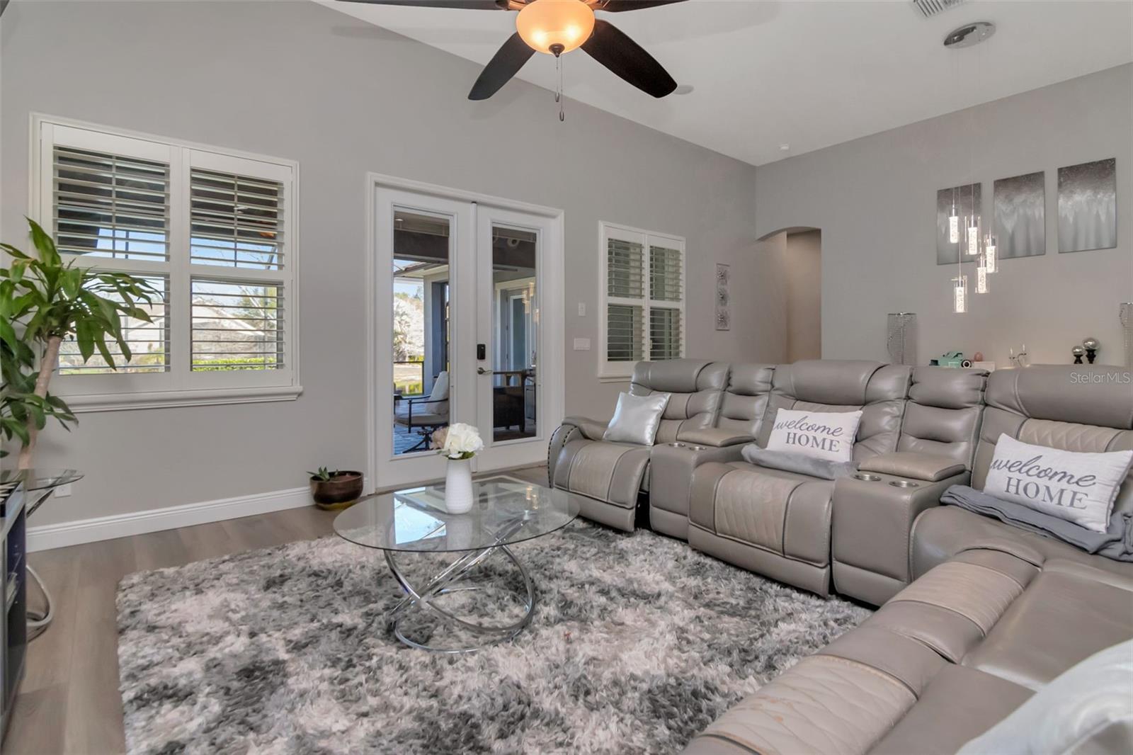 Great Room with Elegant French Doors to Covered Lanai/ Pool-Spa