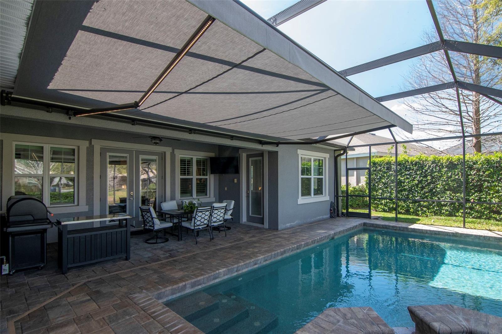 Pool with Retractable Motorized Awing