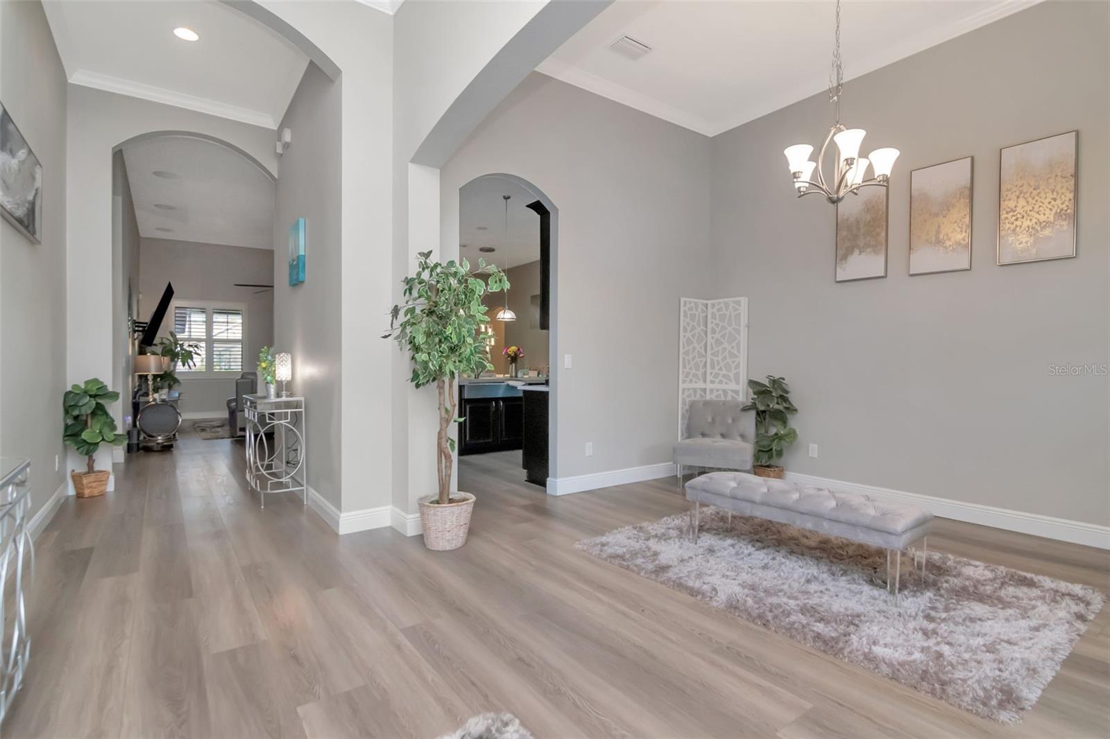 Elegant Spacious Hallway Leading to Great Room / Kitchen / Dining Area