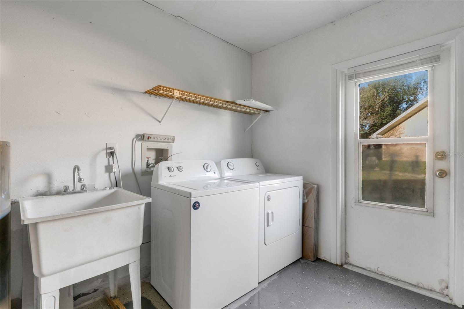 Laundry facilities with utility Sink.
