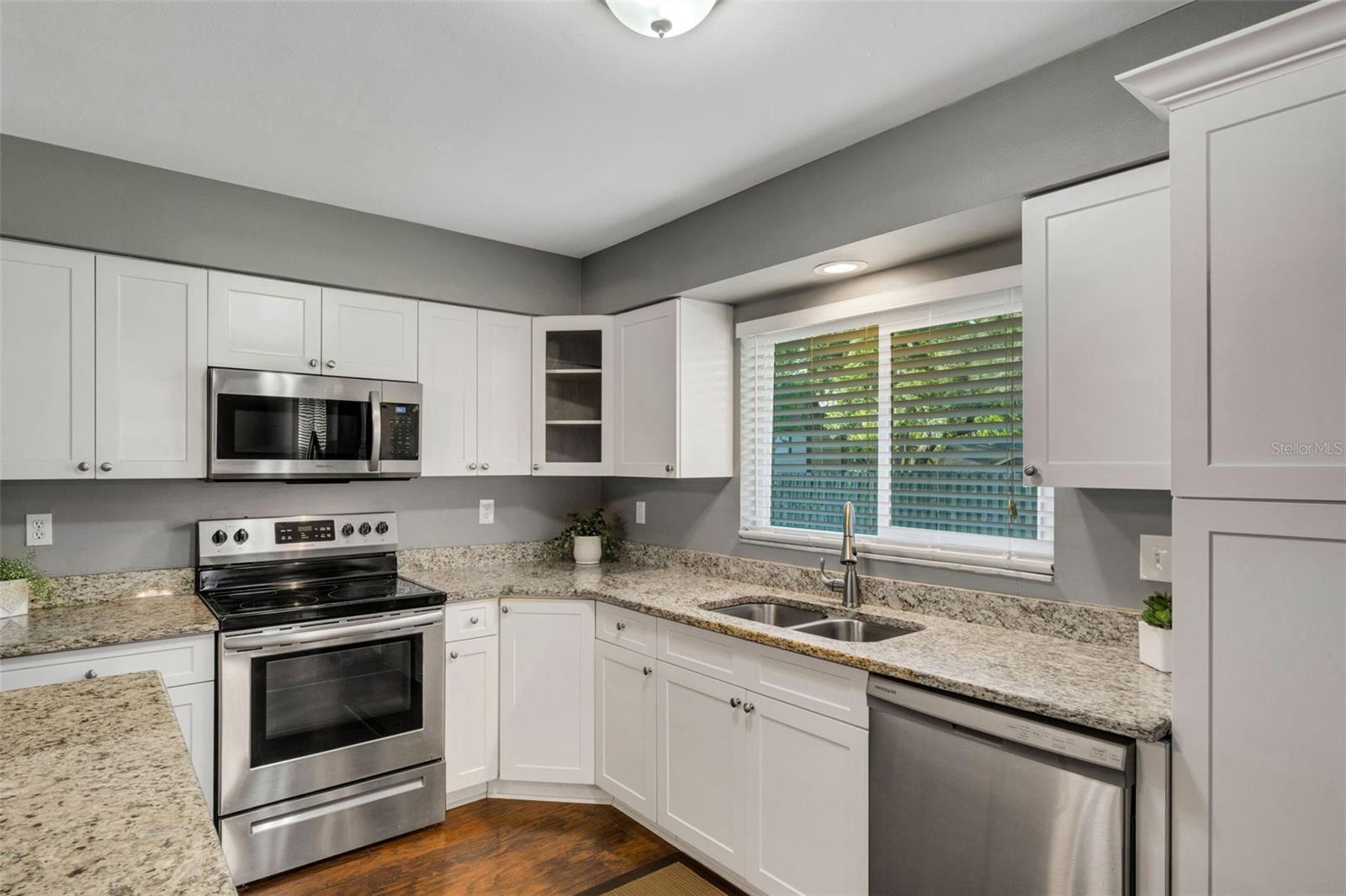 Stainless steel appliances, soft close drawers, Granite counter tops, large corner lazy Susan.