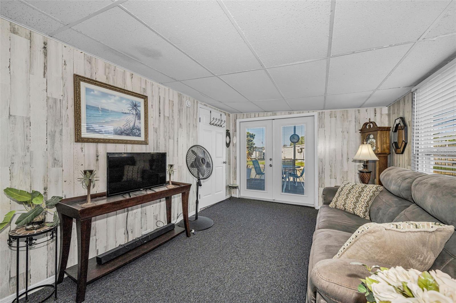 Florida room opens to the back deck