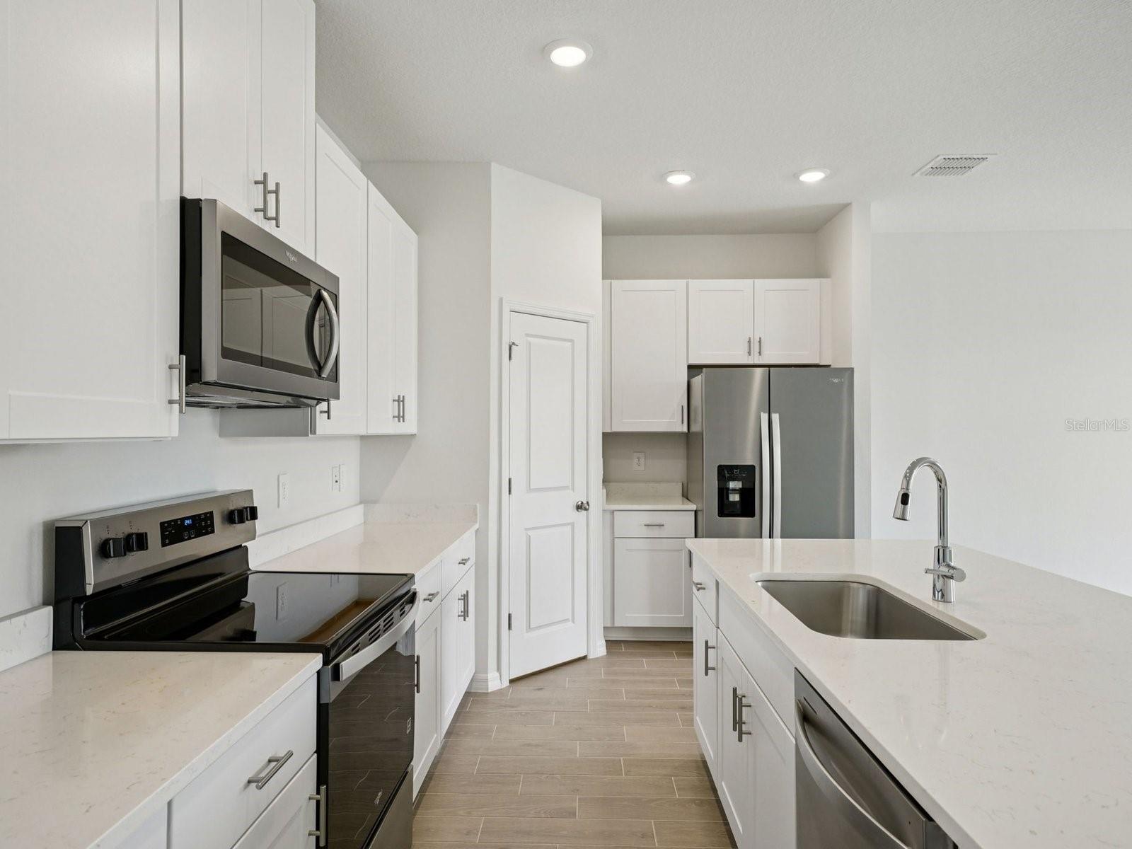 Interior photos are not of the actual home but are photos of the builder home with the same floorplan with similar interior finishes and features.