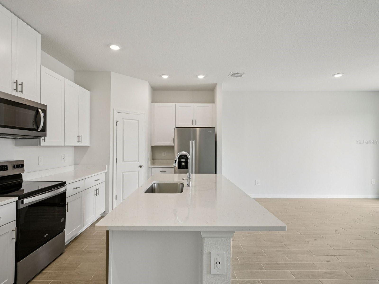 Interior photos are not of the actual home but are photos of the builder home with the same floorplan with similar interior finishes and features.