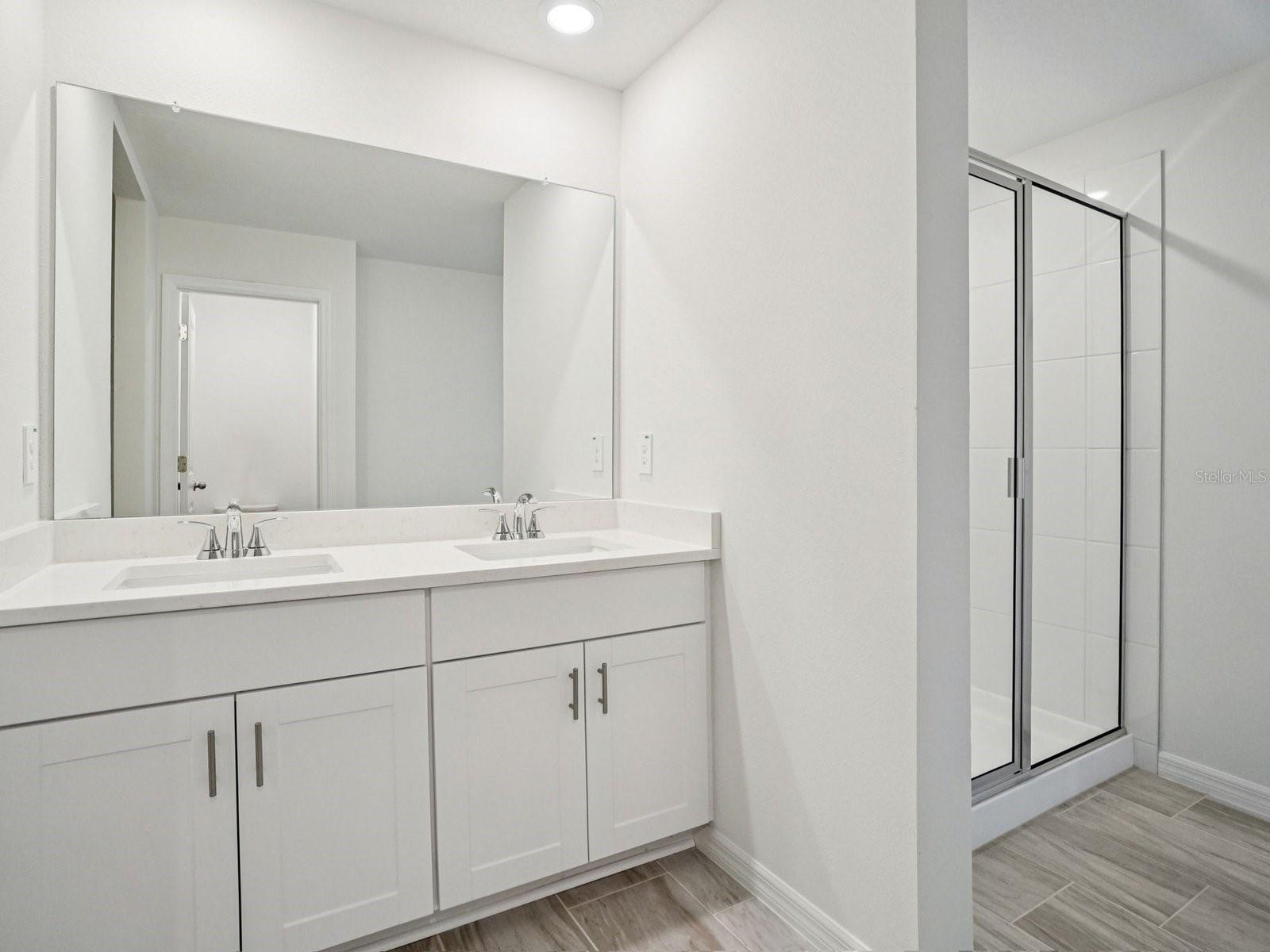 Interior photos are not of the actual home but are photos of the builder home with the same floorplan with similar interior finishes and features.