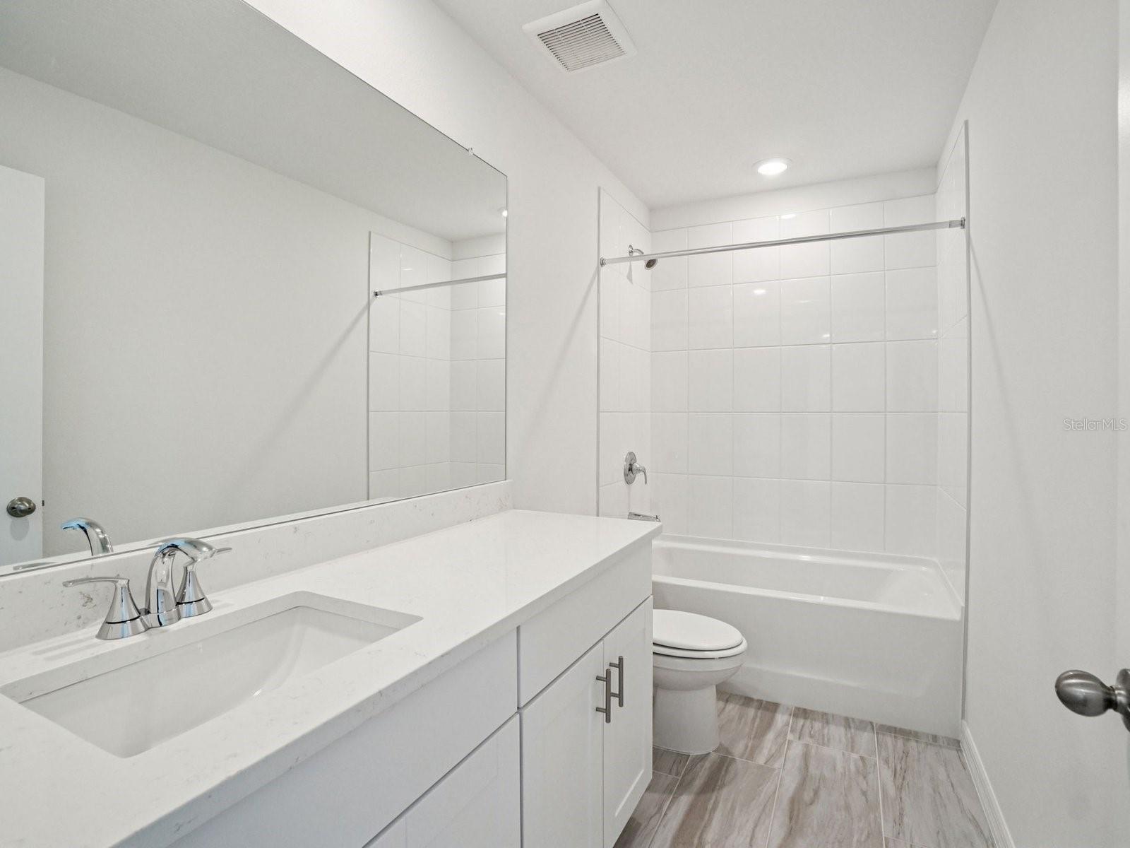 Interior photos are not of the actual home but are photos of the builder home with the same floorplan with similar interior finishes and features.