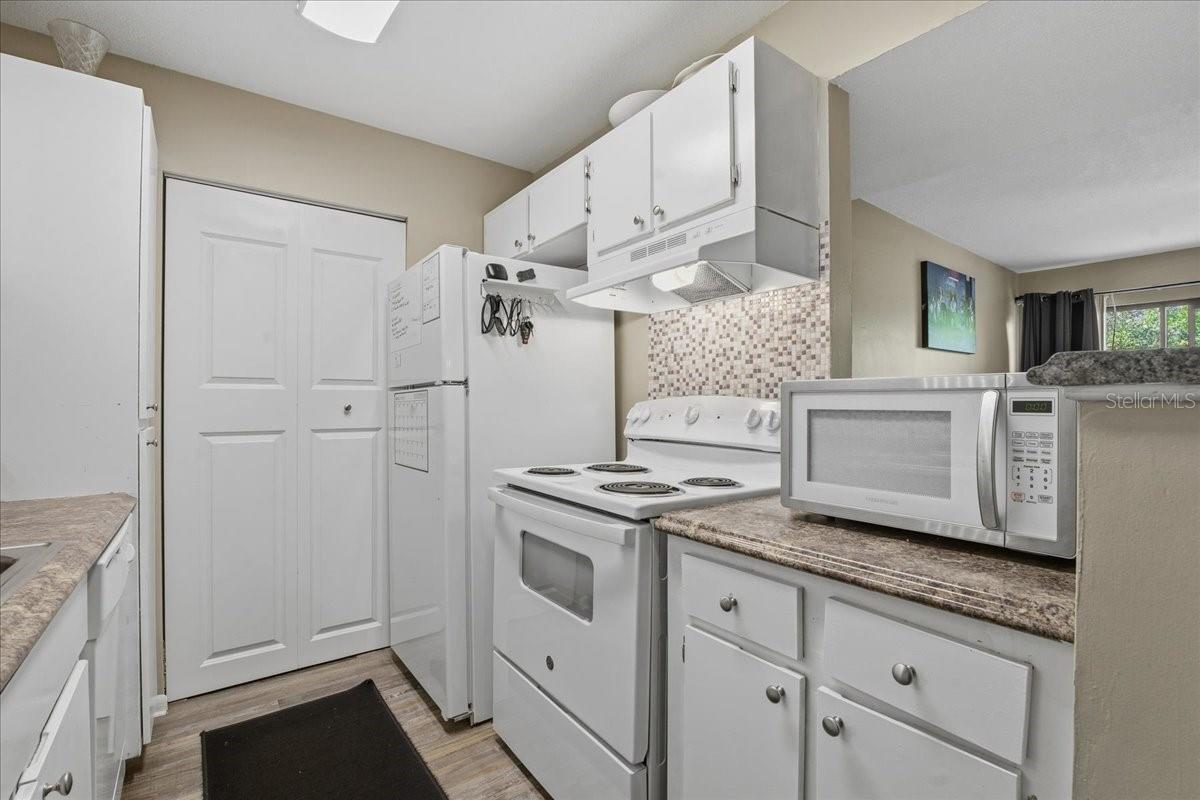 OPENS TO THE DINING AND FAMILY ROOM