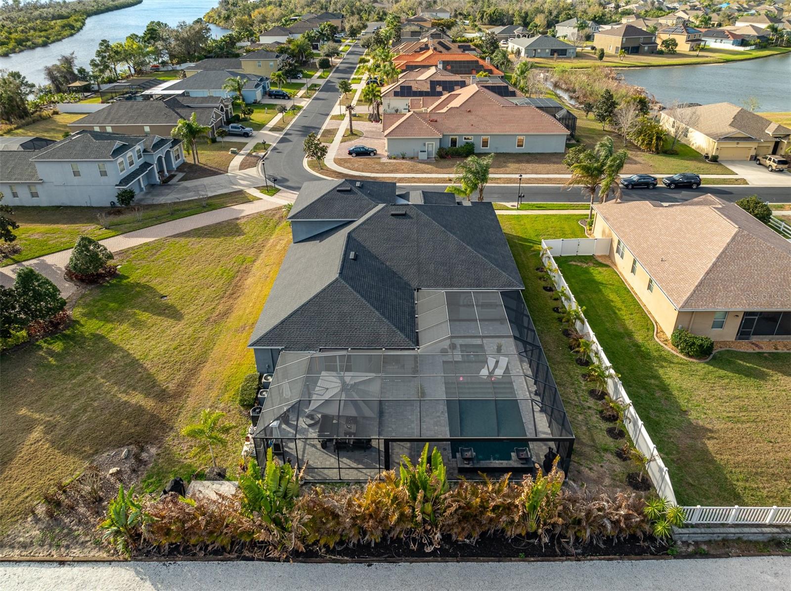 Direct overhead shot showing the roofline and the scale of the outdoor living area.