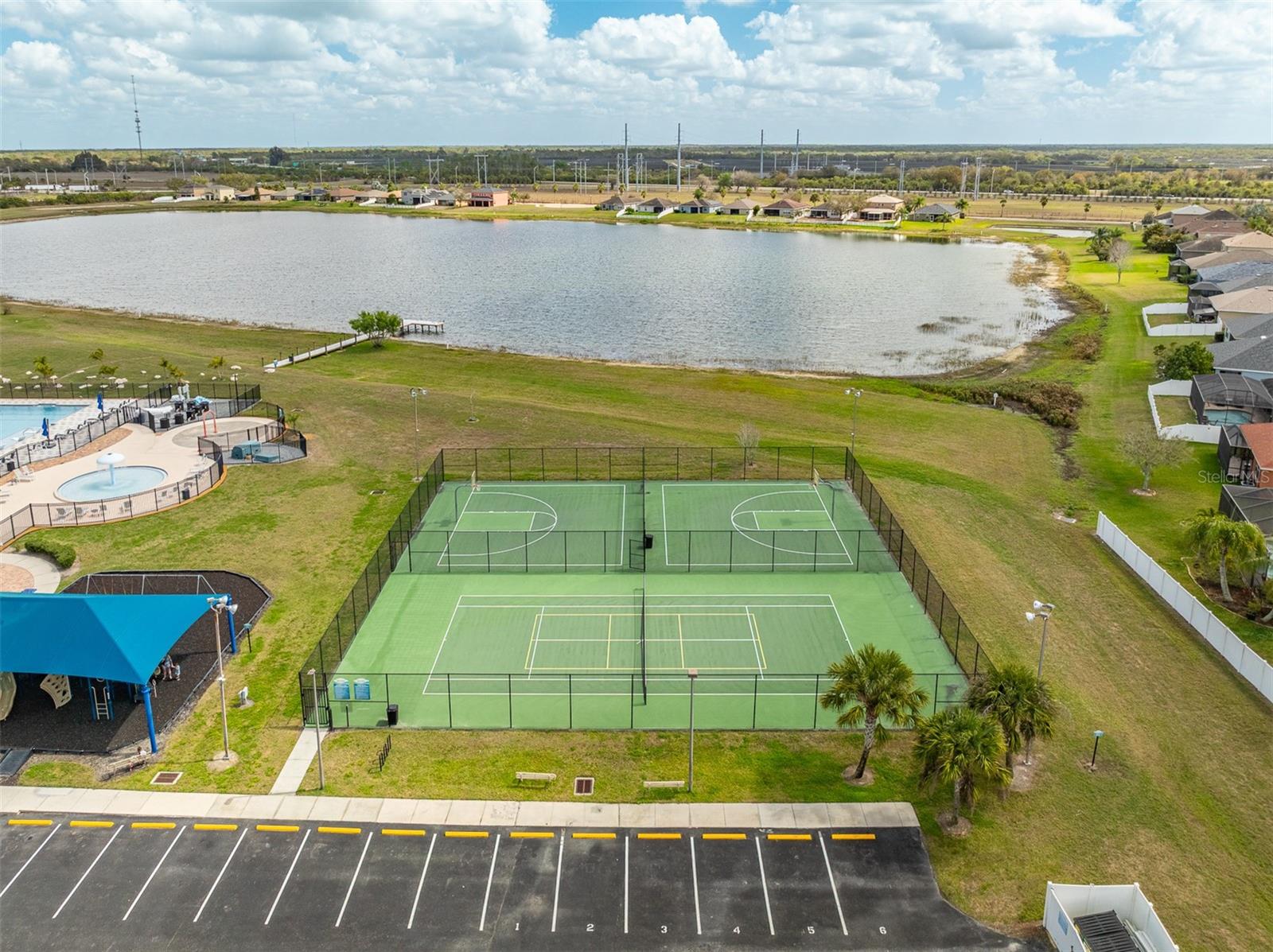Close-up of the professional-grade basketball and tennis court facilities.