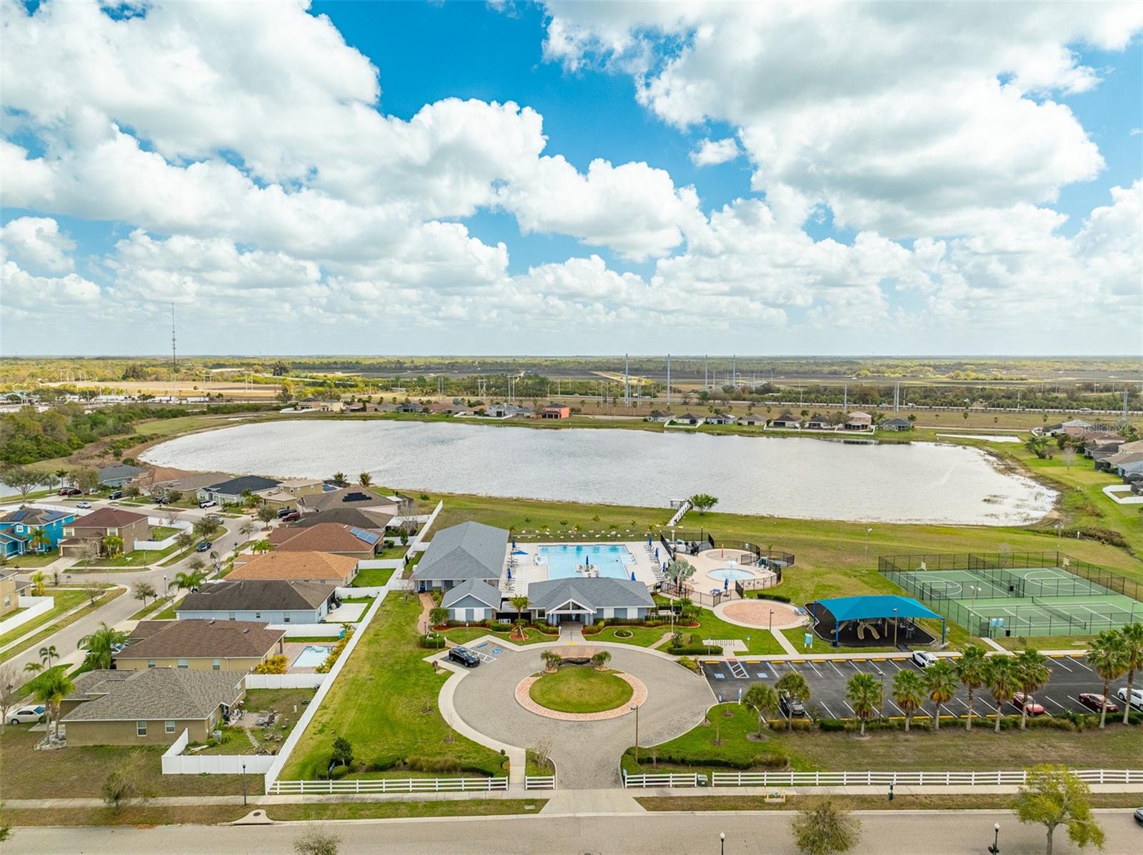 Scenic aerial of the community lake and surrounding River Bend residences.