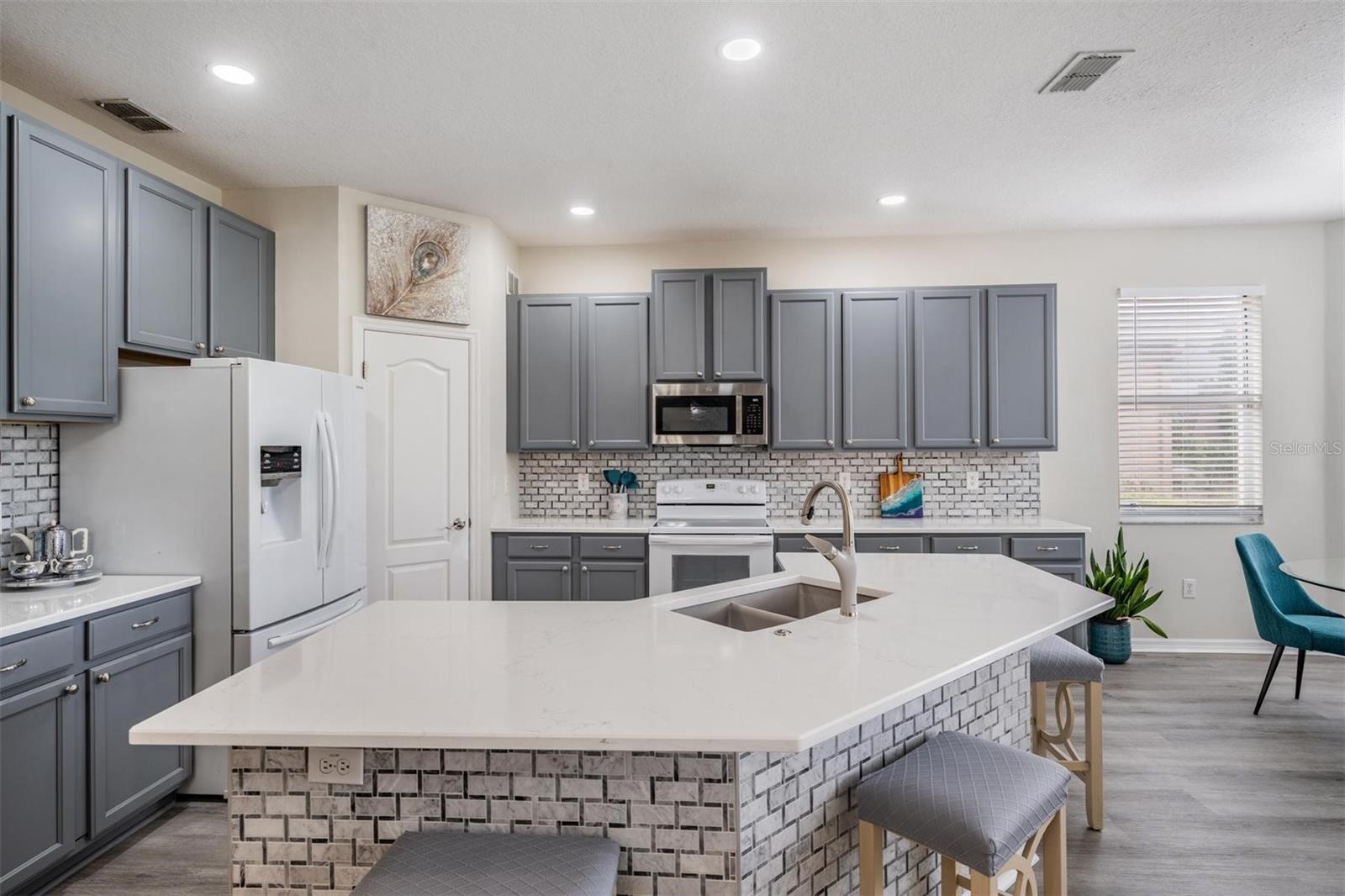 Cabinet and counterspace is plentiful